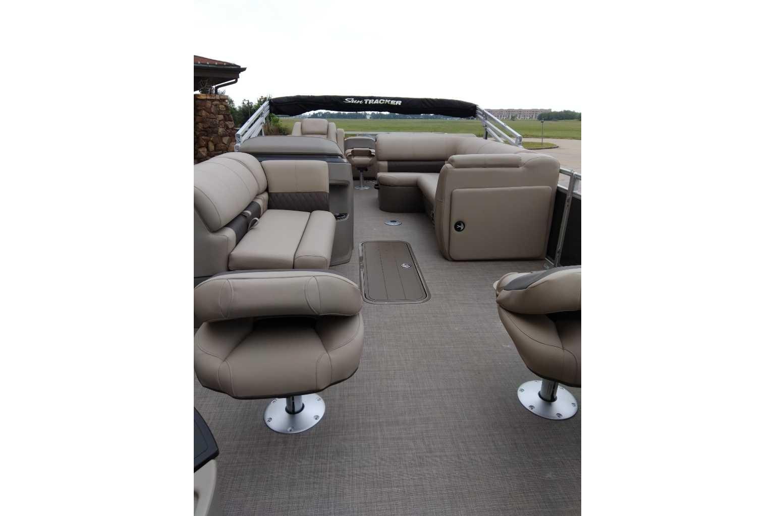 2025 Sun Tracker Fishin' Barge 22 XP3 interior with spacious seating and modern design.