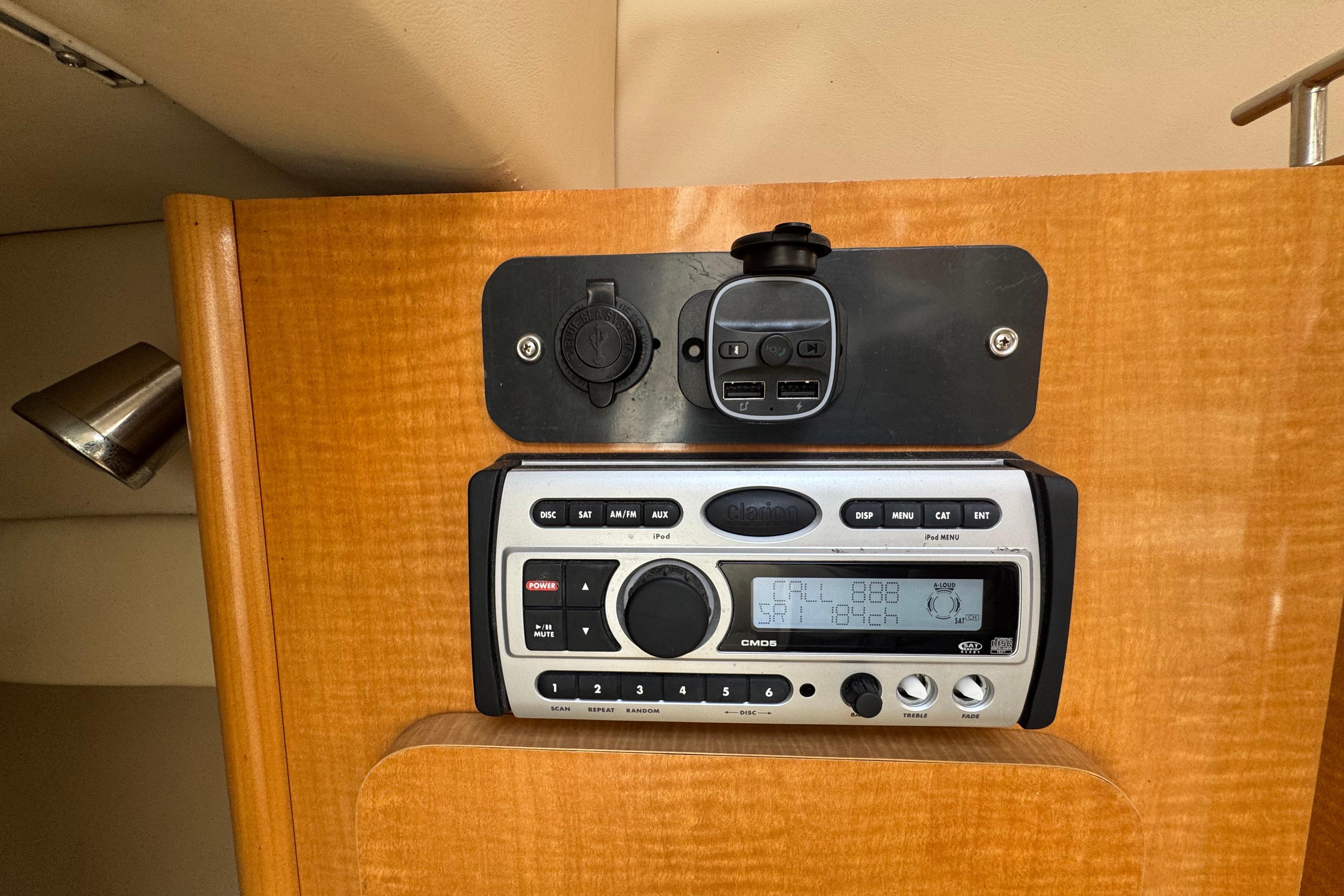 2008 Larson Cabrio 260 boat stereo system with USB ports and control panel.