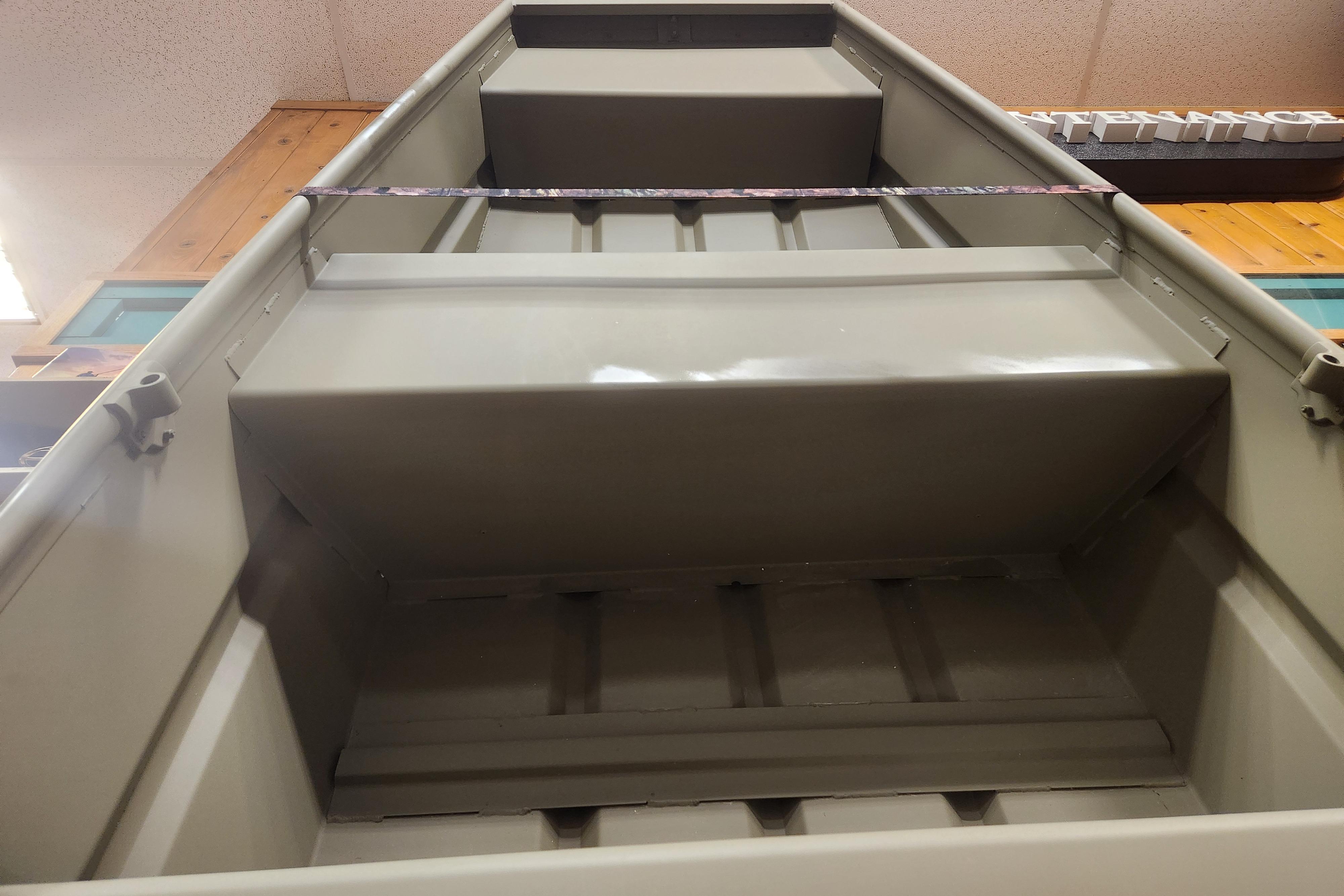 2025 Tracker Grizzly 1036 Utility boat interior, showcasing seating and storage design.