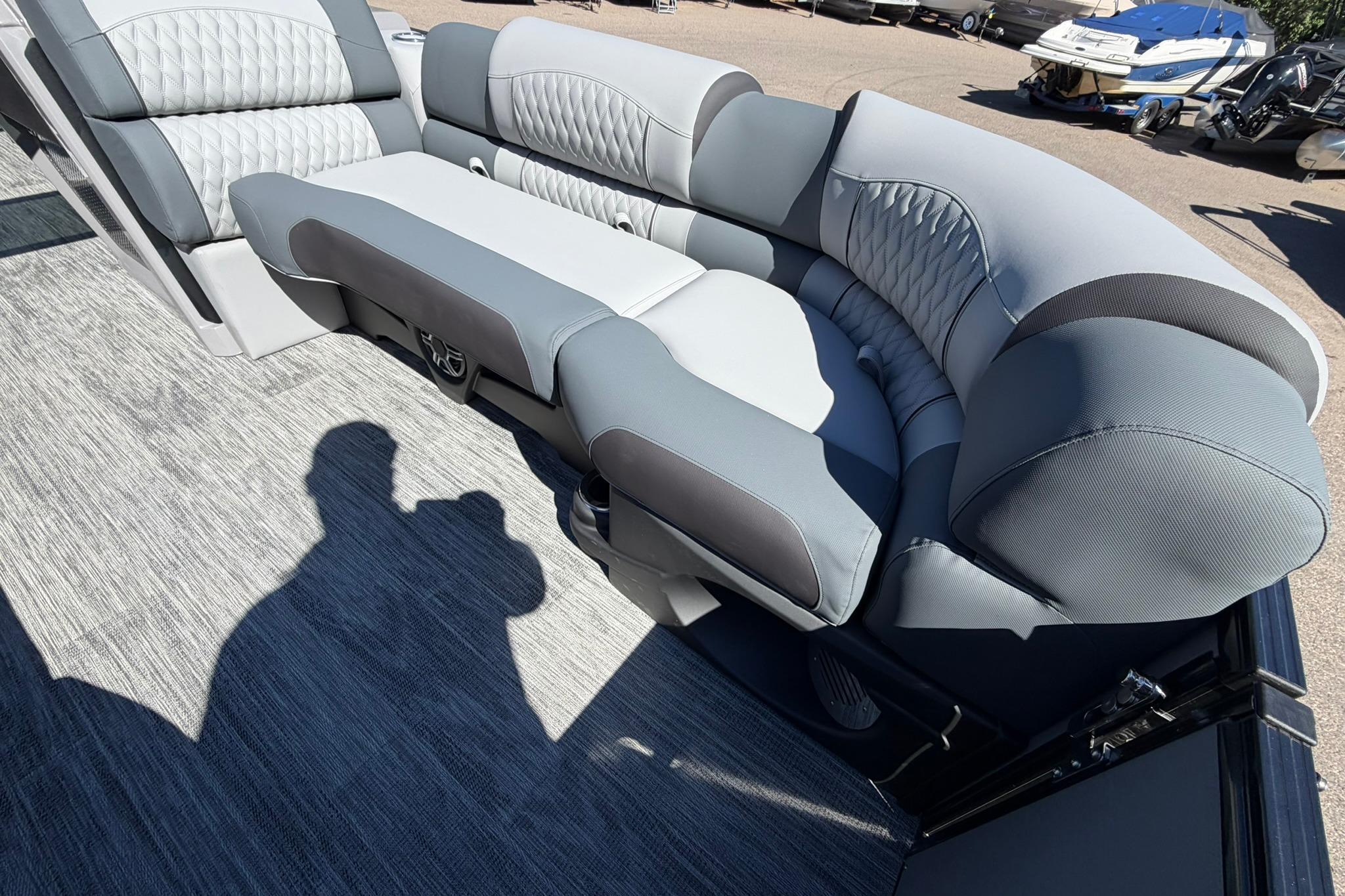 Luxurious seating on 2026 Avalon Excalibur LTD Quad Lounge boat, featuring elegant upholstery and design.