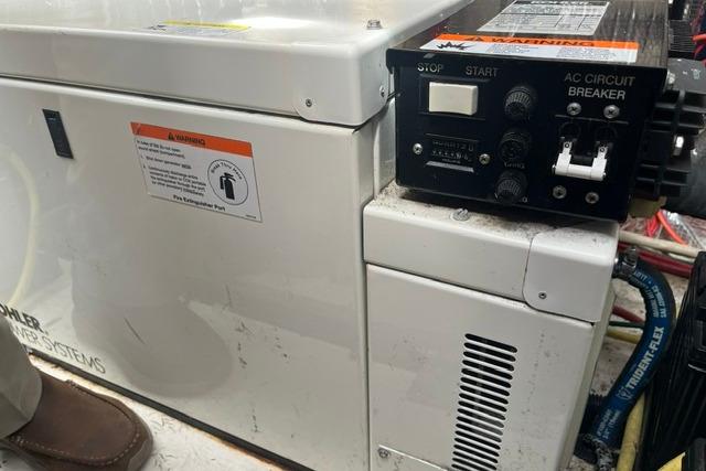Electrical panel and generator system on a 2004 Cruisers Yachts 3372 Express.