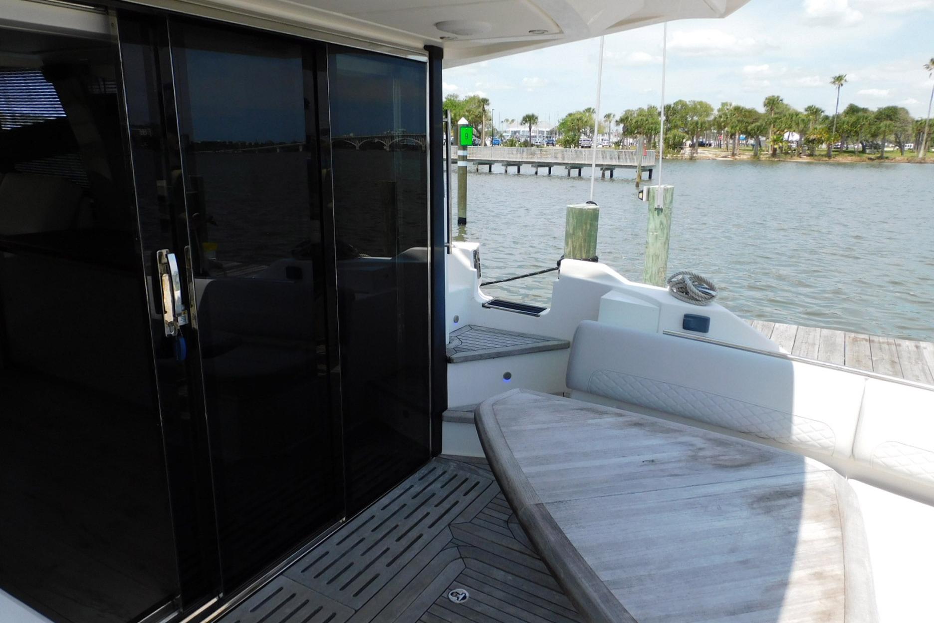 2019 Sea Ray L550 yacht deck with seating and water view.