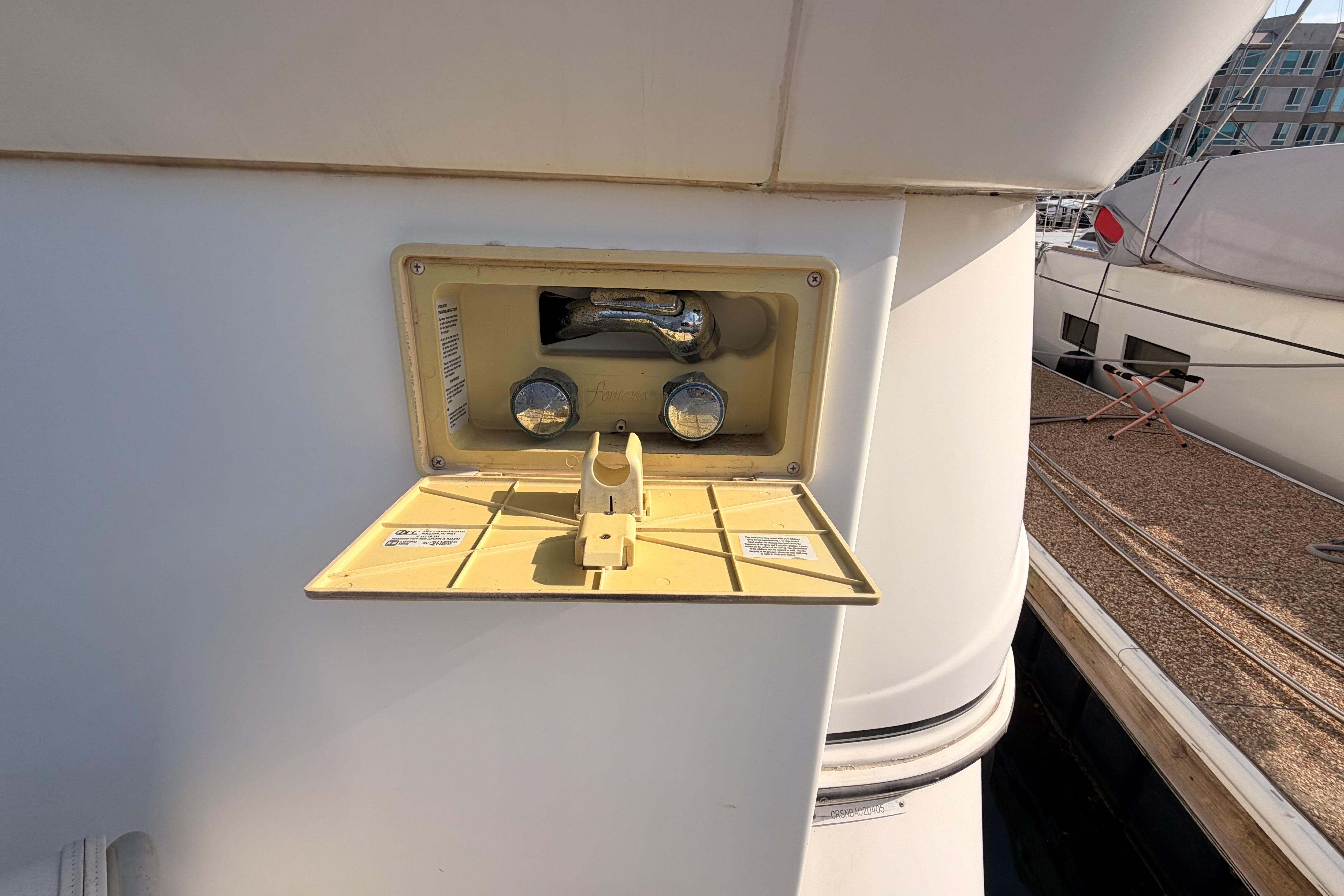 2005 Cruisers Yachts 405 Express Motoryacht outdoor shower fixture on deck.