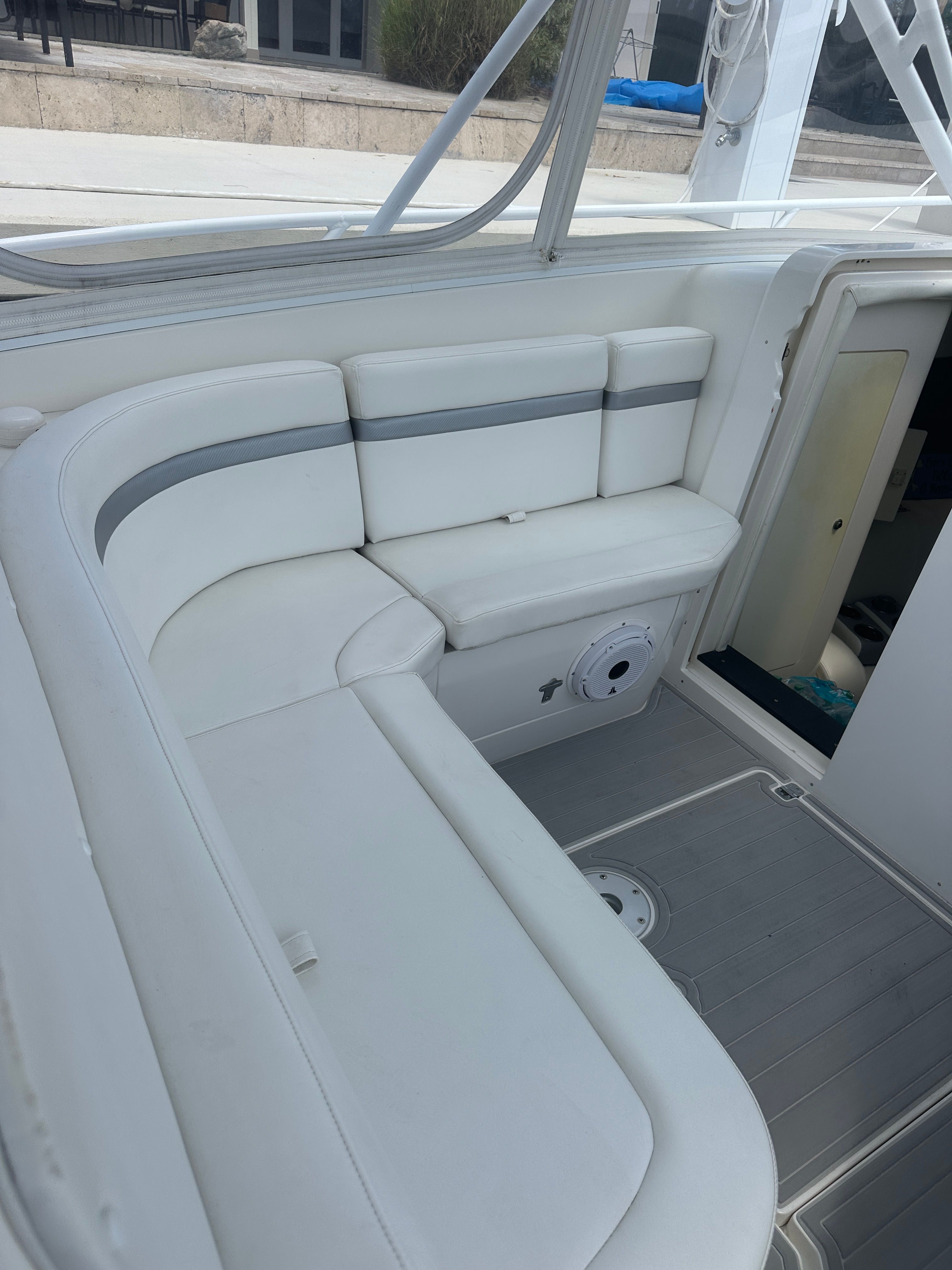 Interior of a 2004 Intrepid 377 Walkaround with white upholstery.