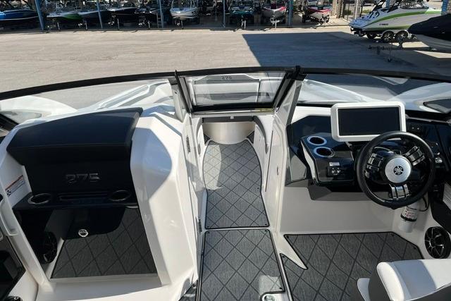 2021 Yamaha Boats 275SD interior with modern dashboard and seating.