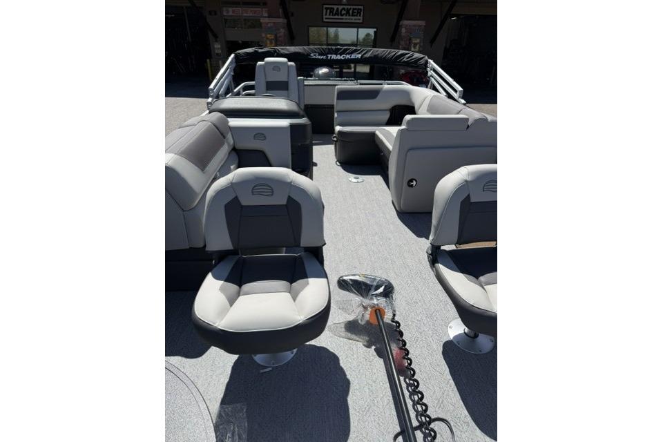 2026 Sun Tracker Fishin' Barge 20 DLX interior with comfortable seating and modern design.