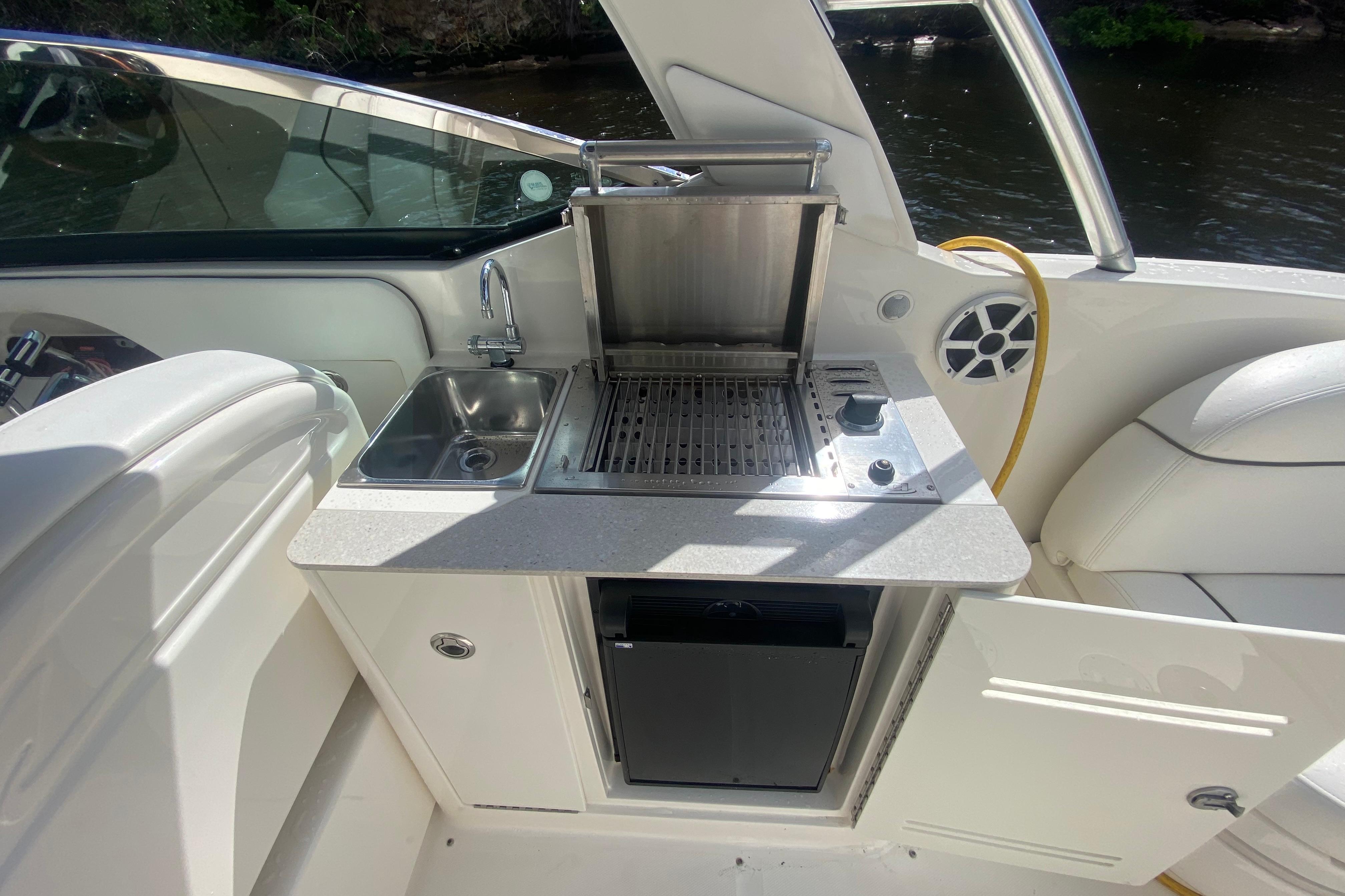 Grill with fridge and sink