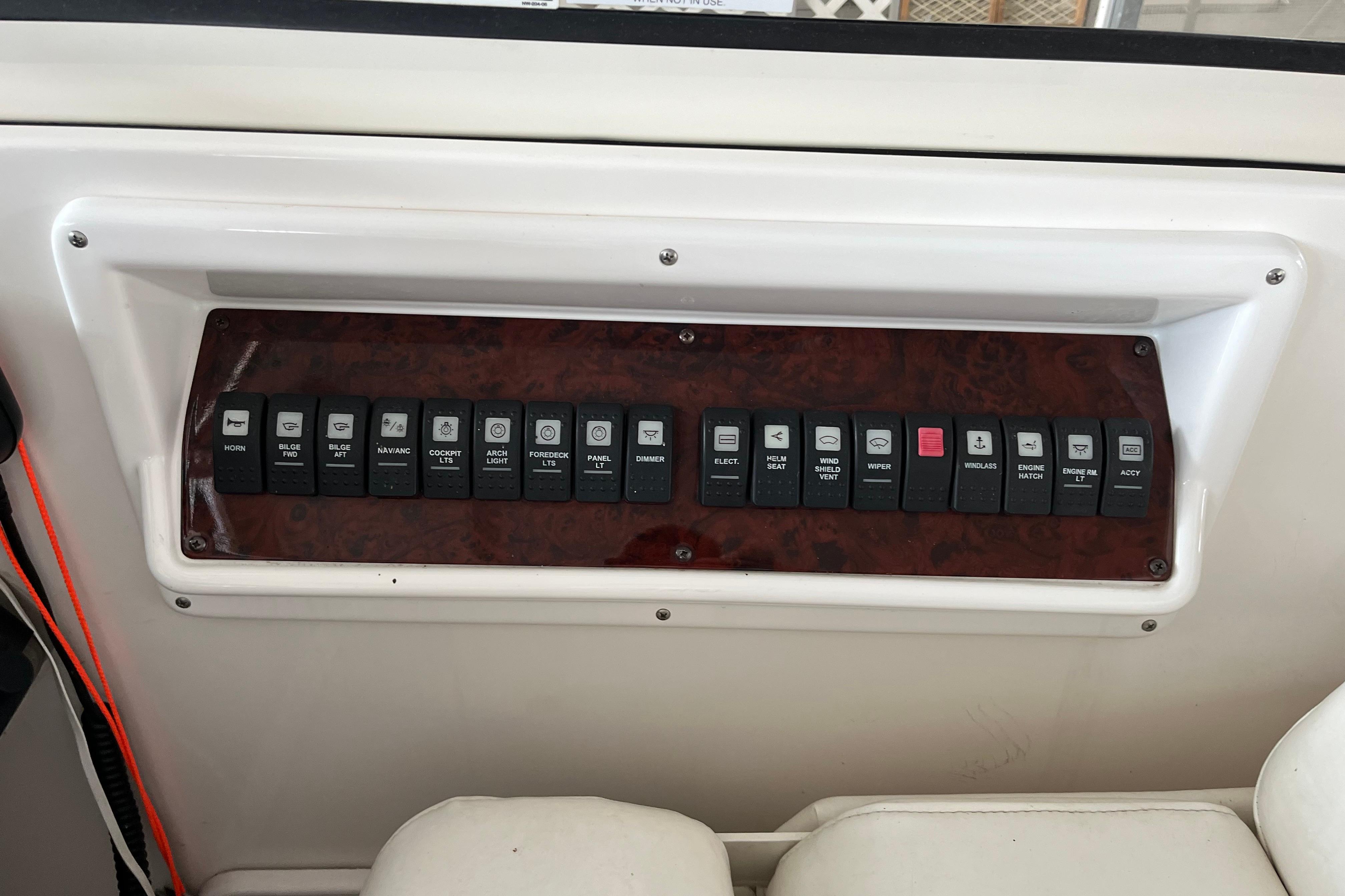 Control panel of a 2007 Regal 3760 IB Commodore boat with labeled switches.