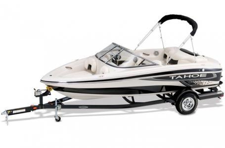 2012 Tahoe Q4 SS boat on trailer, white with black accents, sleek design.