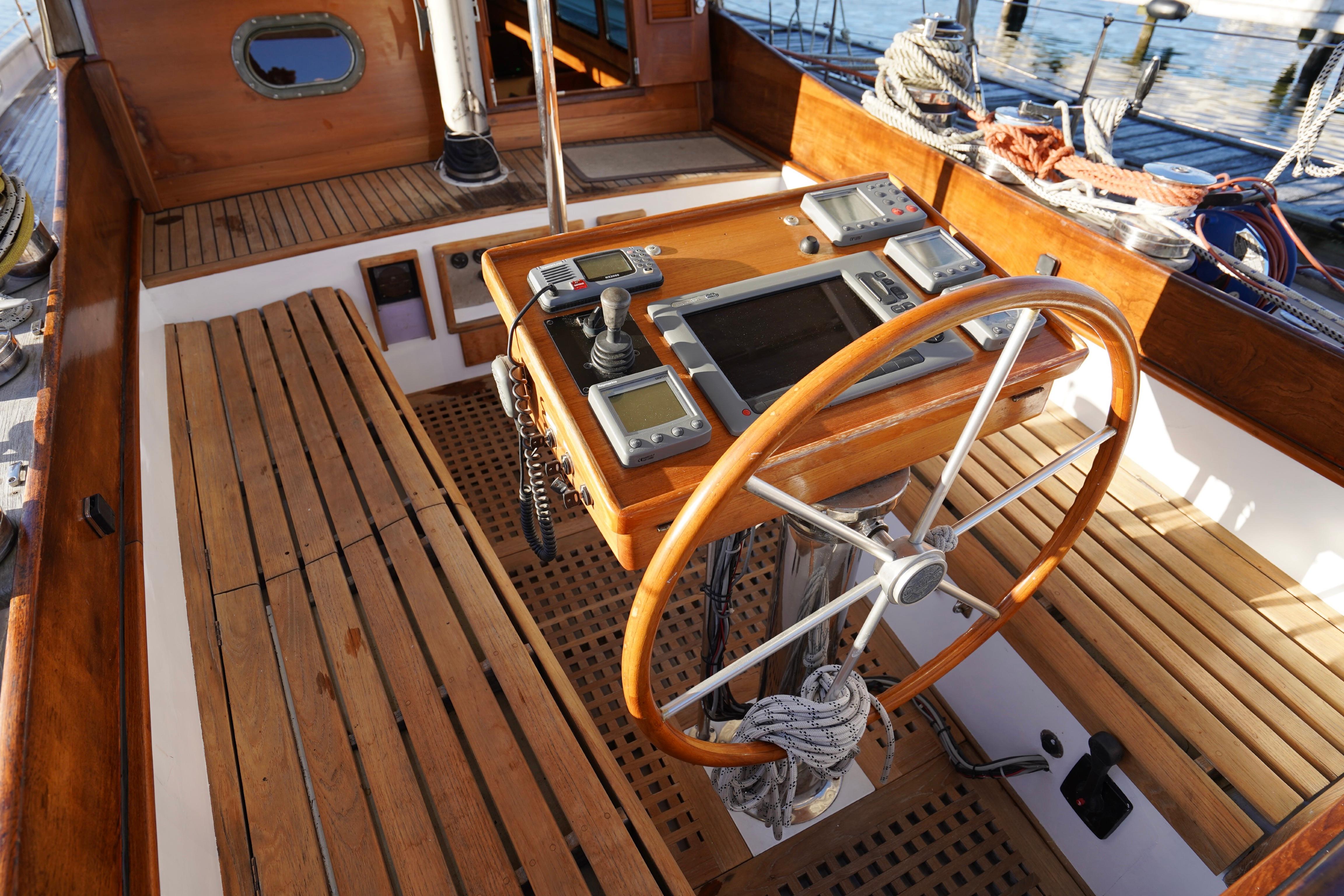 Wooden helm of 1977 Van Dam De Vries Lentsch 57 Classic Ketch sailboat.