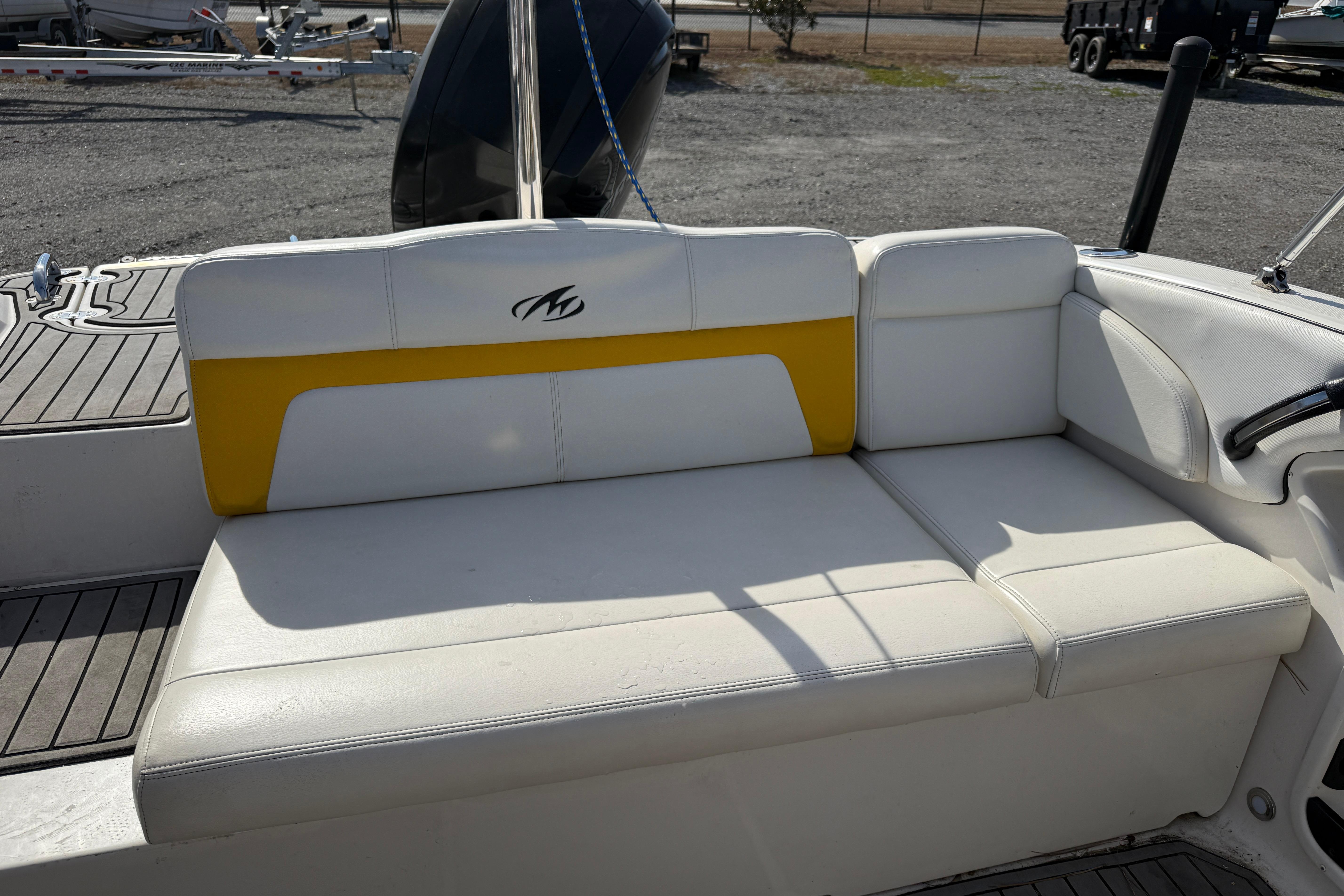 2014 Monterey 197 Blackfin boat with white and yellow seating.
