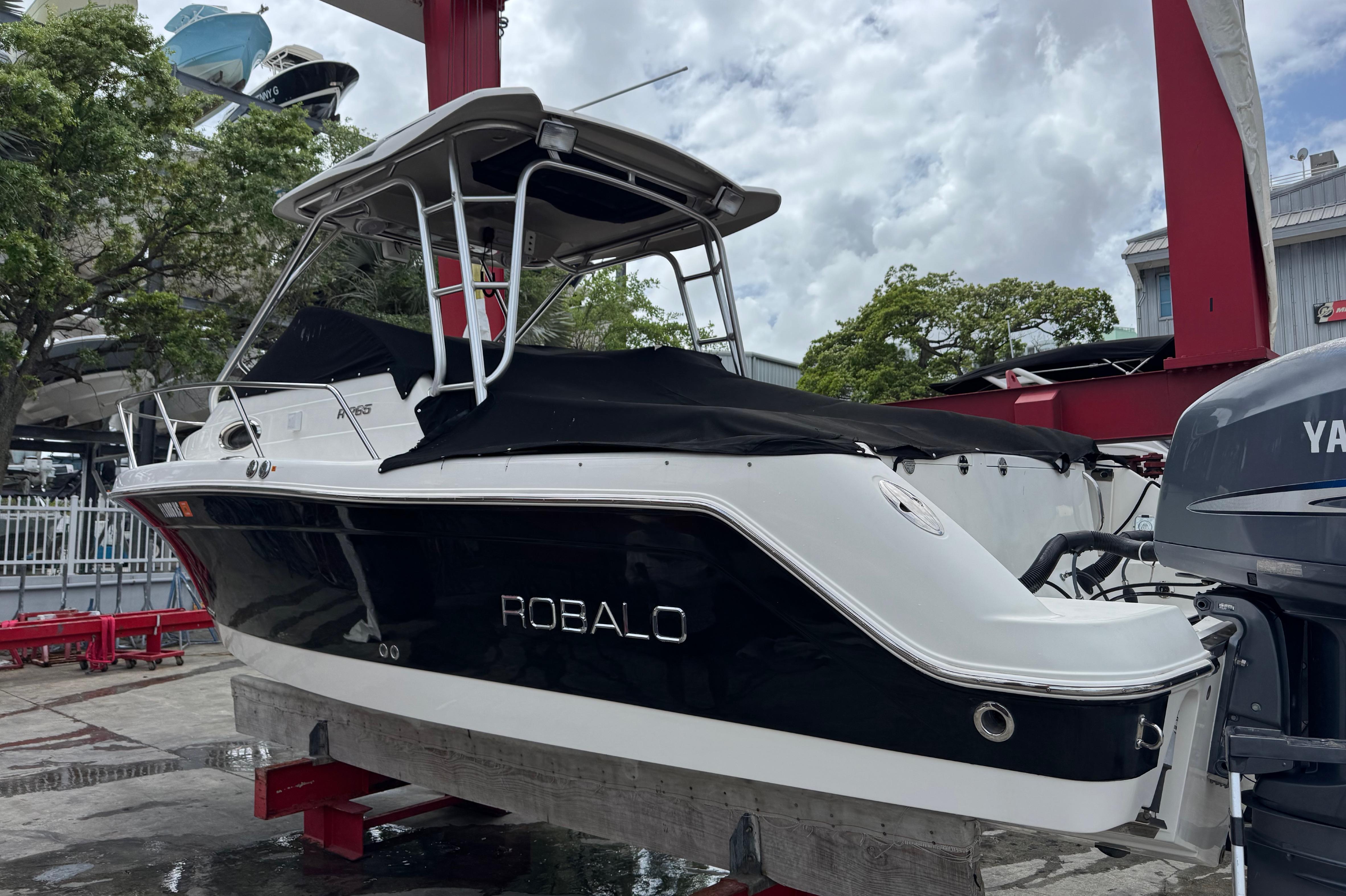 2008 Robalo R265 Walkaround boat on display, featuring sleek design and Yamaha engine.
