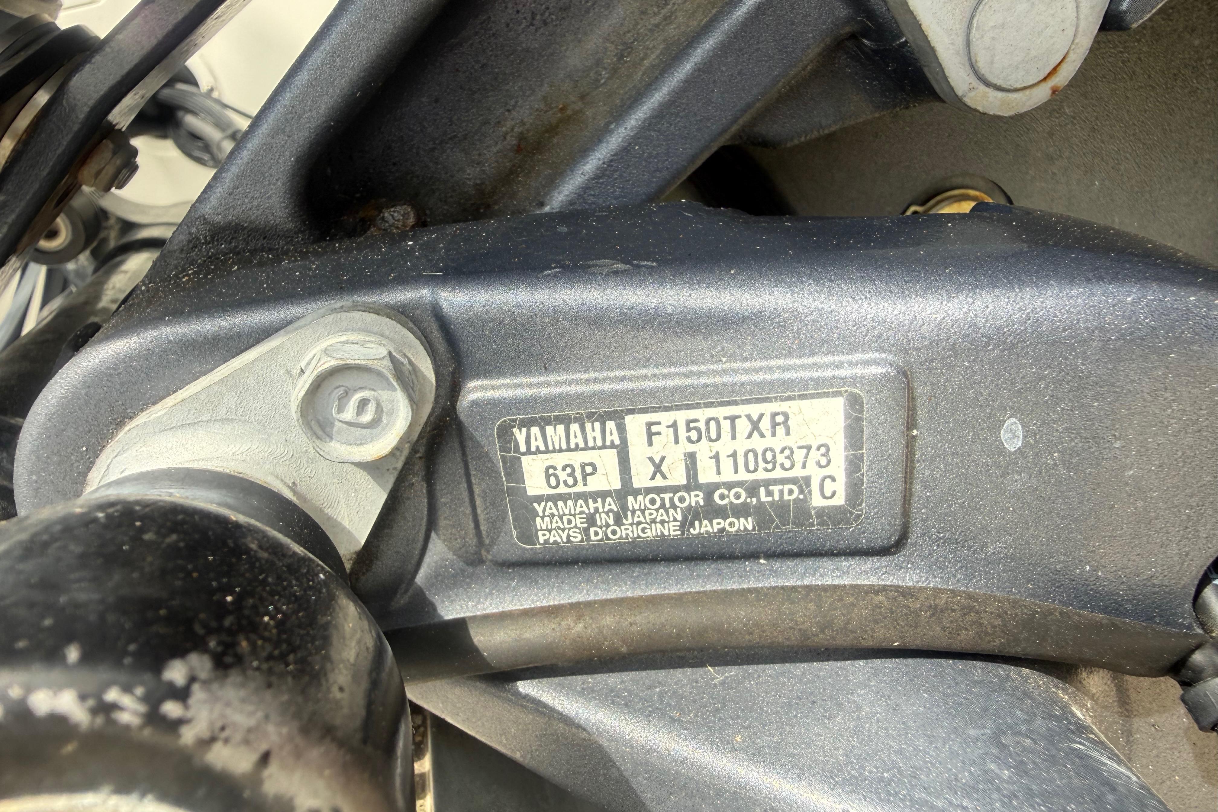Yamaha F150TXR engine label on 2012 Clearwater 2000 Center Console boat.