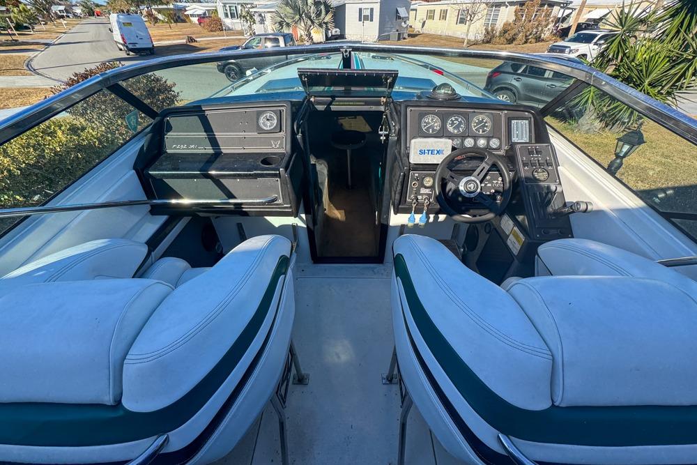 1989 Formula 292 SR-1 boat cockpit with dual seats and control panel.