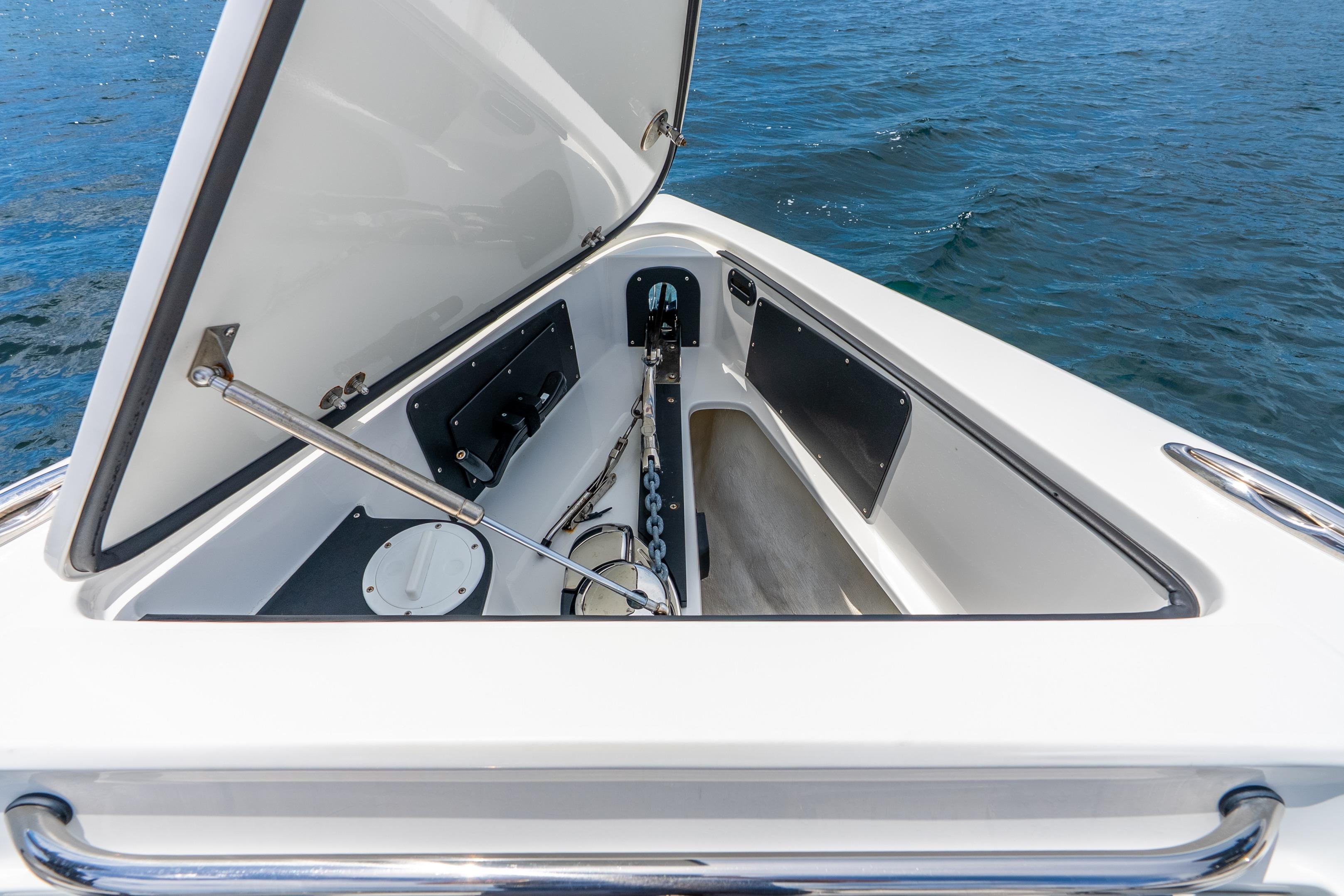 Open anchor compartment on 2024 Nor-Tech 452 Super Fish boat, showcasing storage and mechanism.