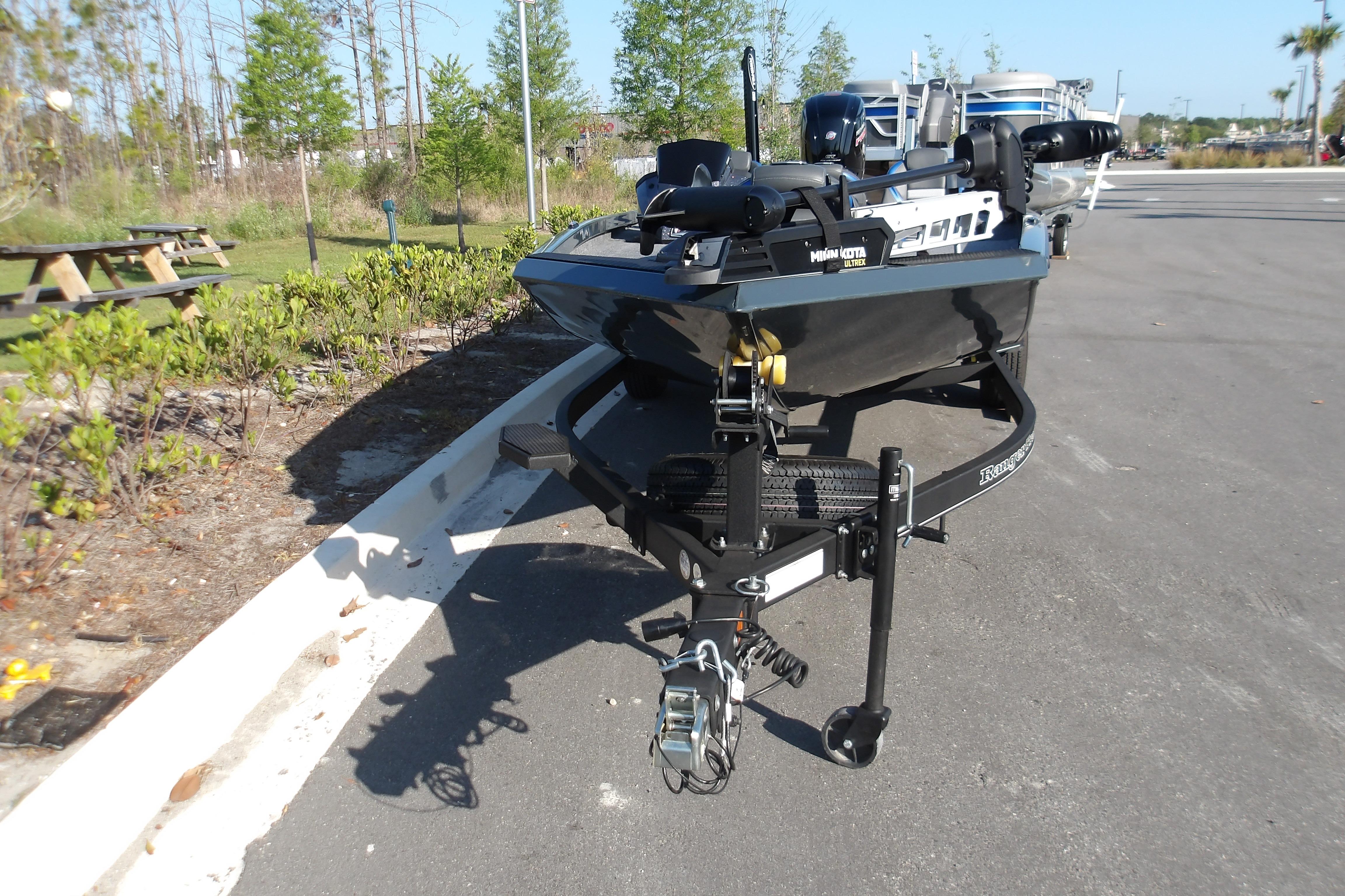 2024 Ranger RT188P boat on trailer in outdoor setting, showcasing sleek design and modern features.