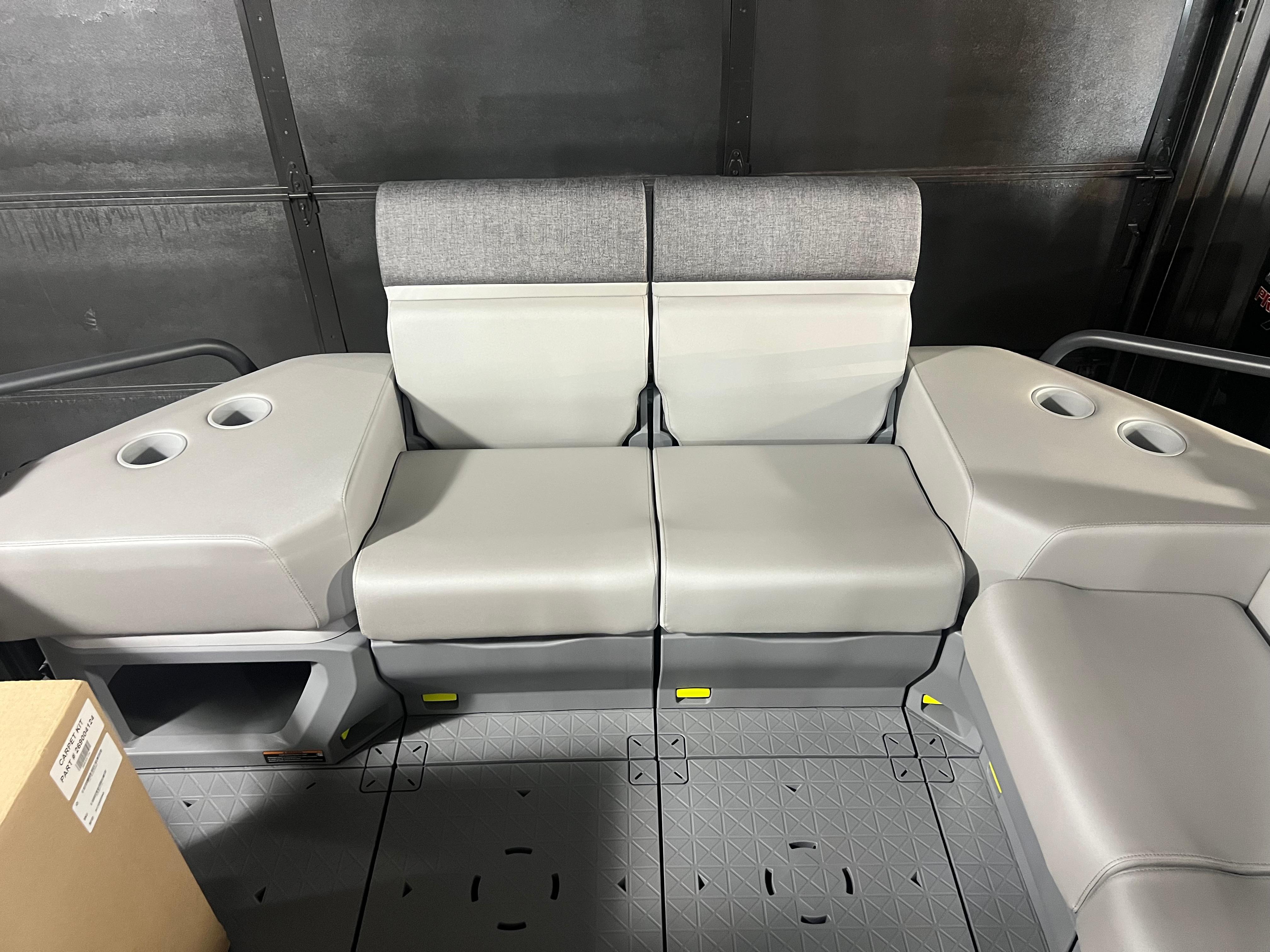 2025 Sea-Doo Switch Cruise 21 seating area with cup holders and gray upholstery.