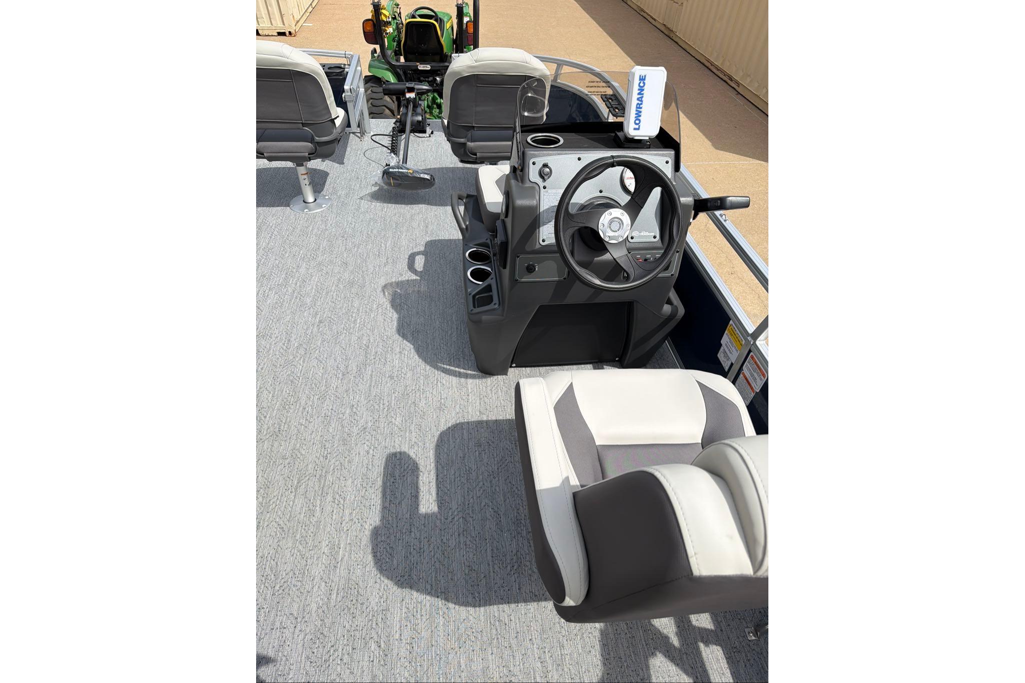 2026 Sun Tracker Bass Buggy 16 XL Select interior with steering console and seating.