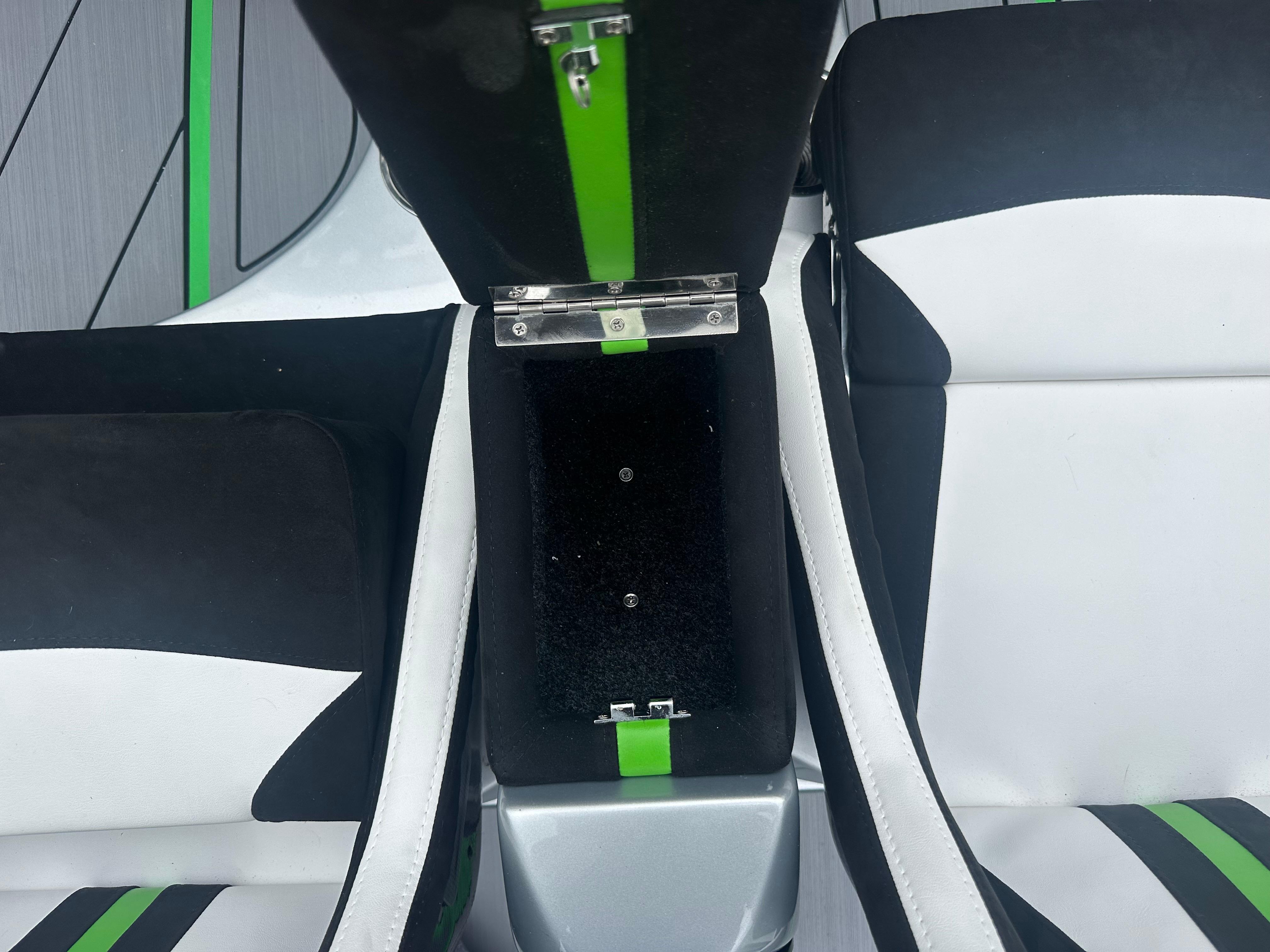 2025 Nor-Tech 4000 Supercat interior with black, white, and green seating design.