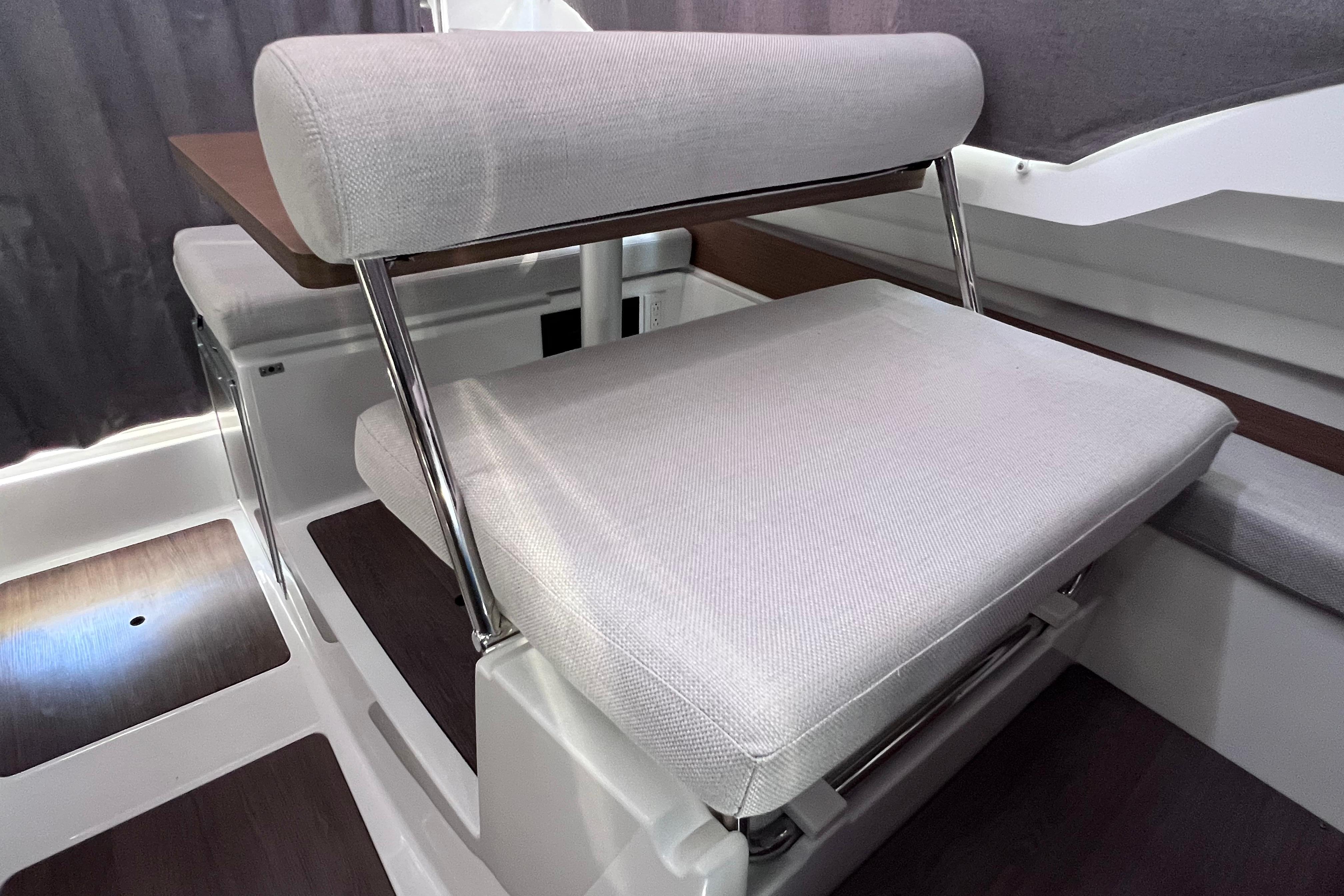 Interior seating of 2021 Jeanneau NC Weekender 795 Series 2 boat, featuring modern design.