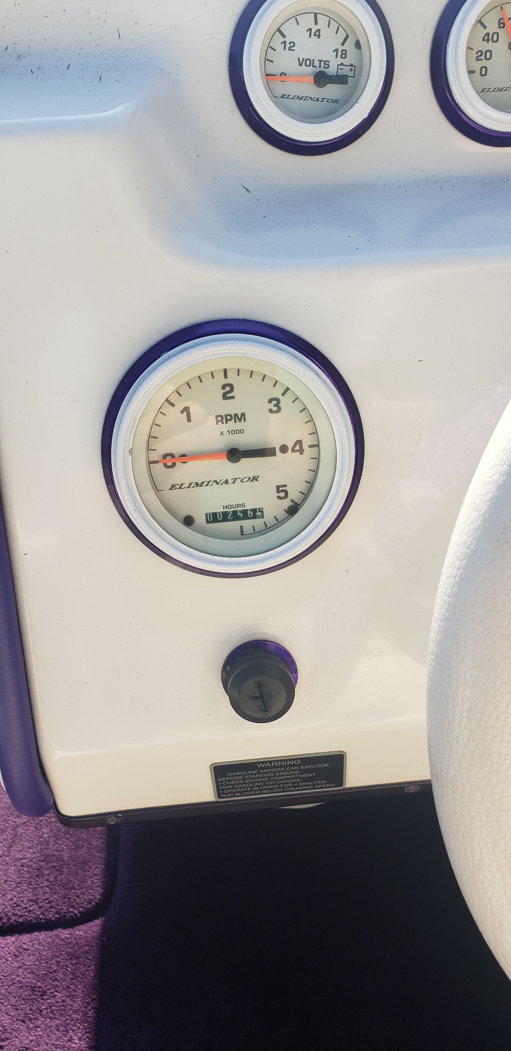 Tachometer and voltmeter in 1999 Eliminator 220 Eagle XP boat.