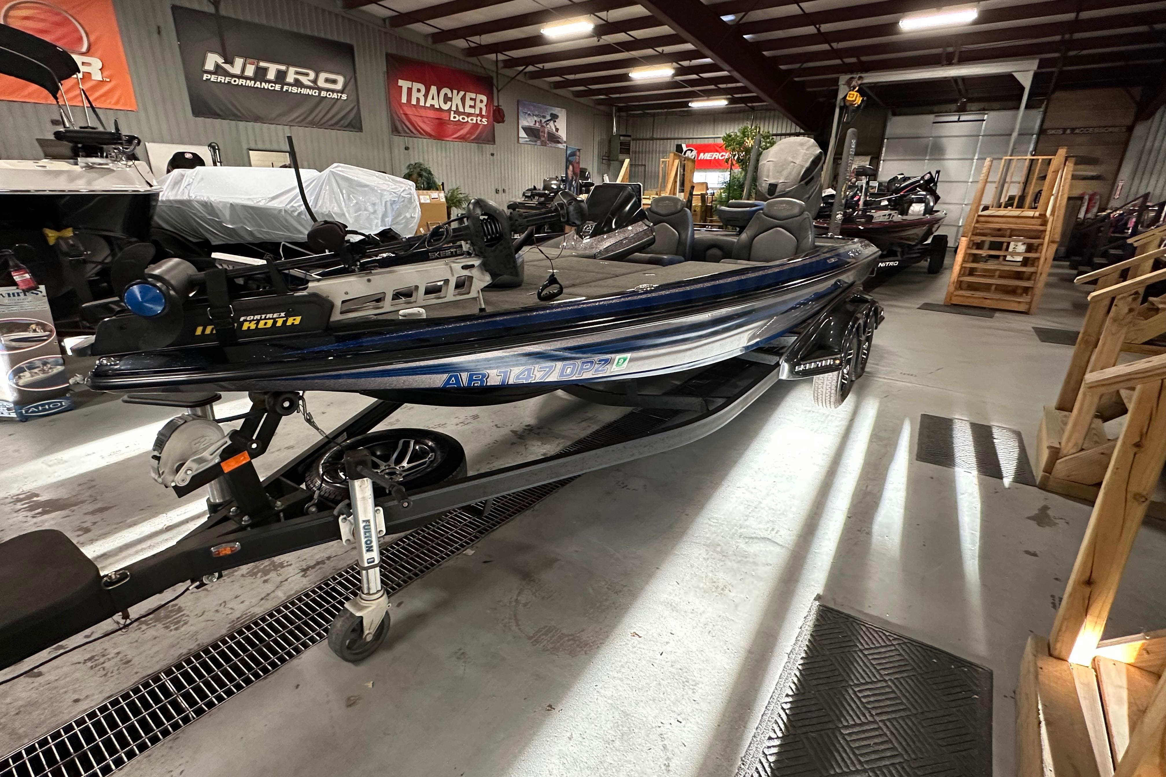 2016 Skeeter FX20 Limited Edition boat in showroom, featuring sleek design and advanced equipment.