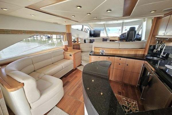 Luxurious interior of a 2005 Sunseeker Manhattan 66 yacht with elegant seating and modern amenities.