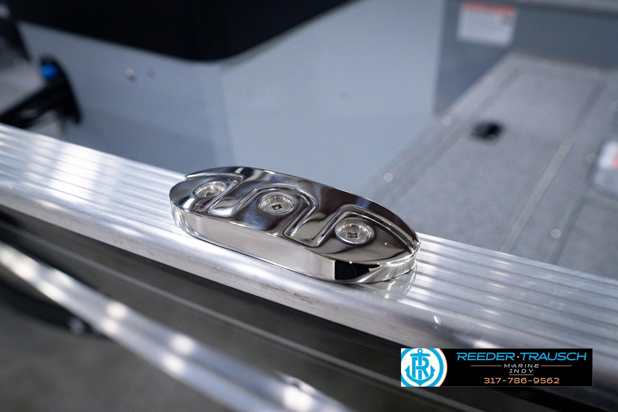 2026 Lund 1600 Fury SS boat detail with sleek chrome hardware and Reeder-Trausch Marine logo.