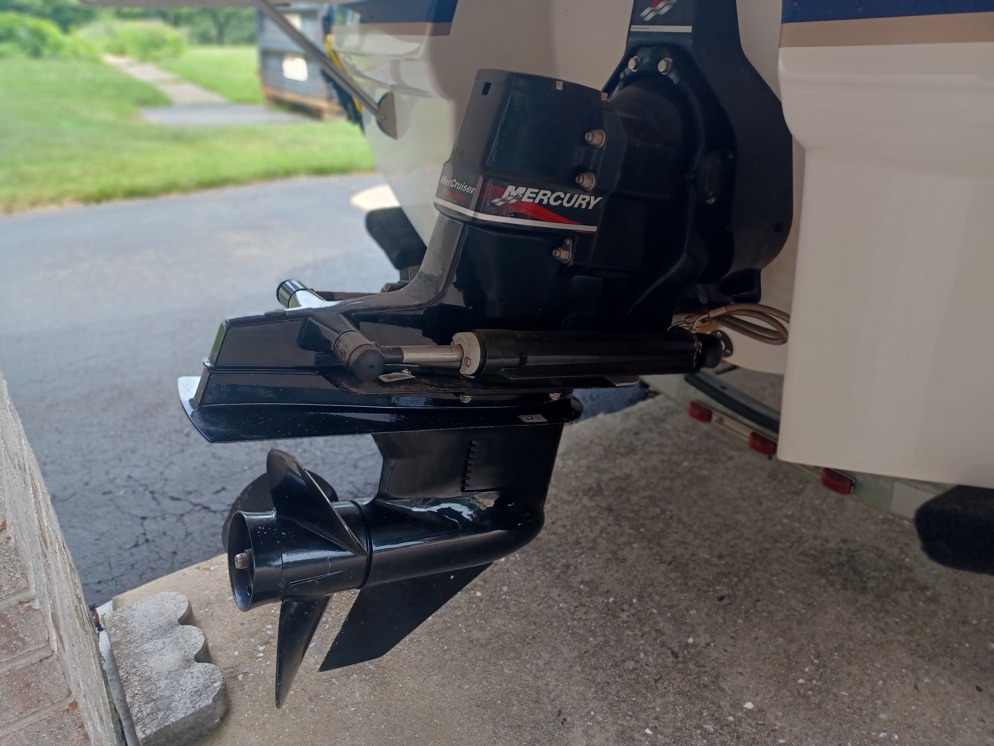 Close-up of a Mercury outboard motor on a 2004 Chaparral 215 SSi boat.