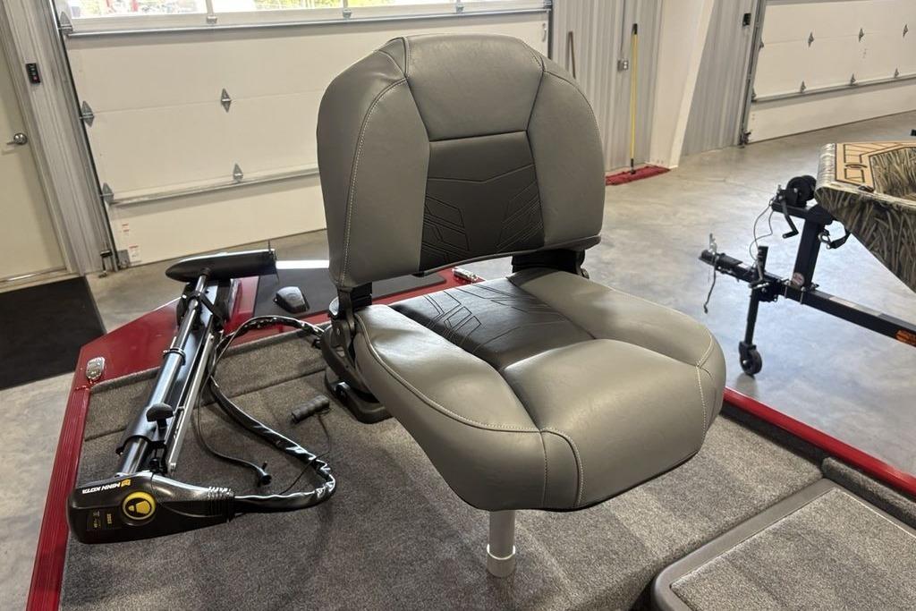 2026 Tracker Bass Tracker Classic XL boat seat in a garage setting.