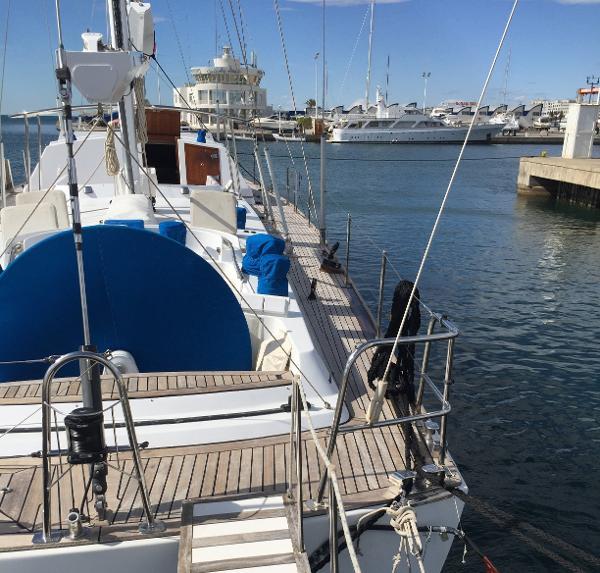 Ketch EUROMARINE 32 Vallicelli 2000 docked at marina, clear sky, calm water.