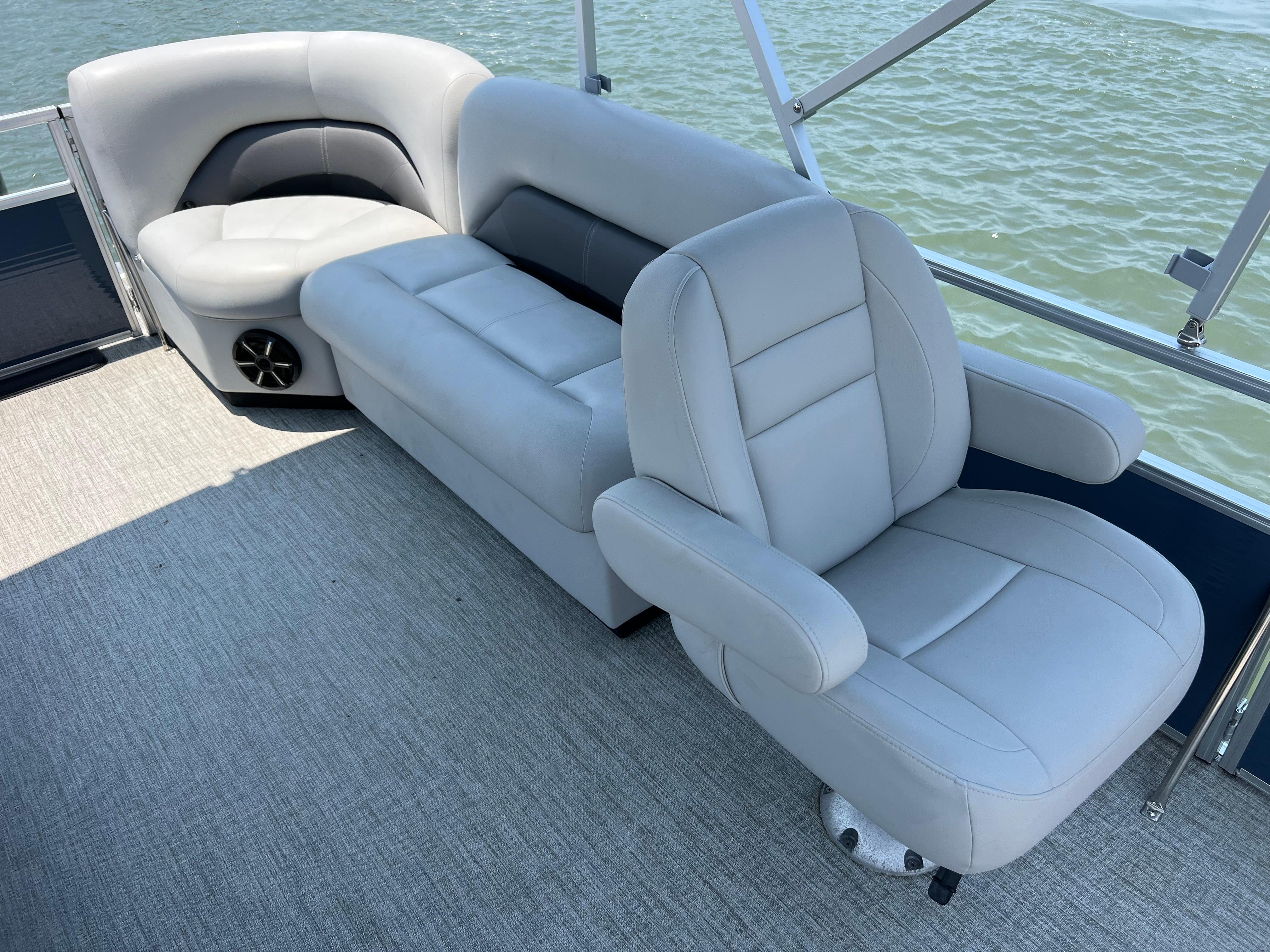 2023 Landau Island Breeze 232 pontoon boat with luxurious seating.