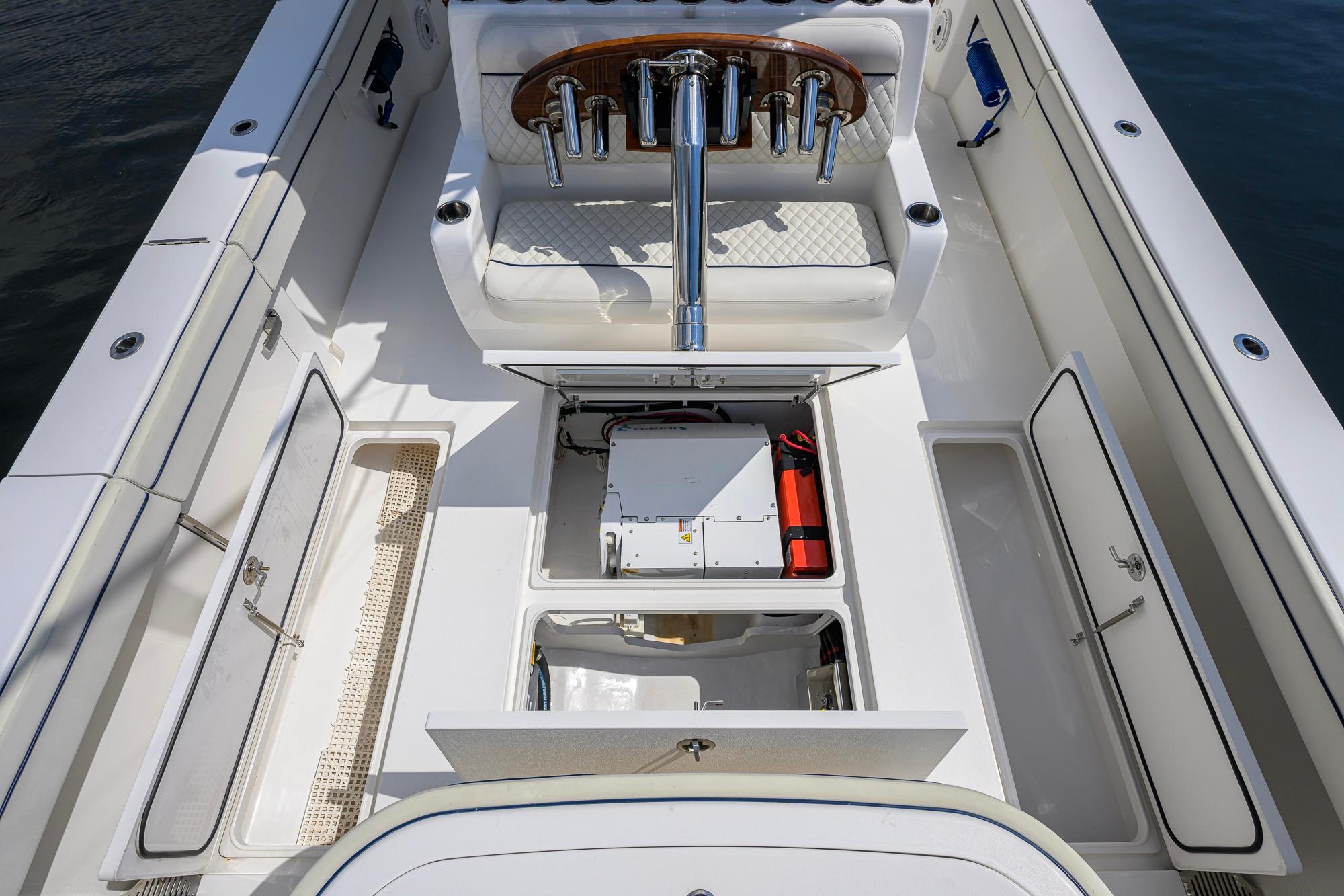 2020 Valhalla Boatworks V-41 interior with open storage compartments and seating.