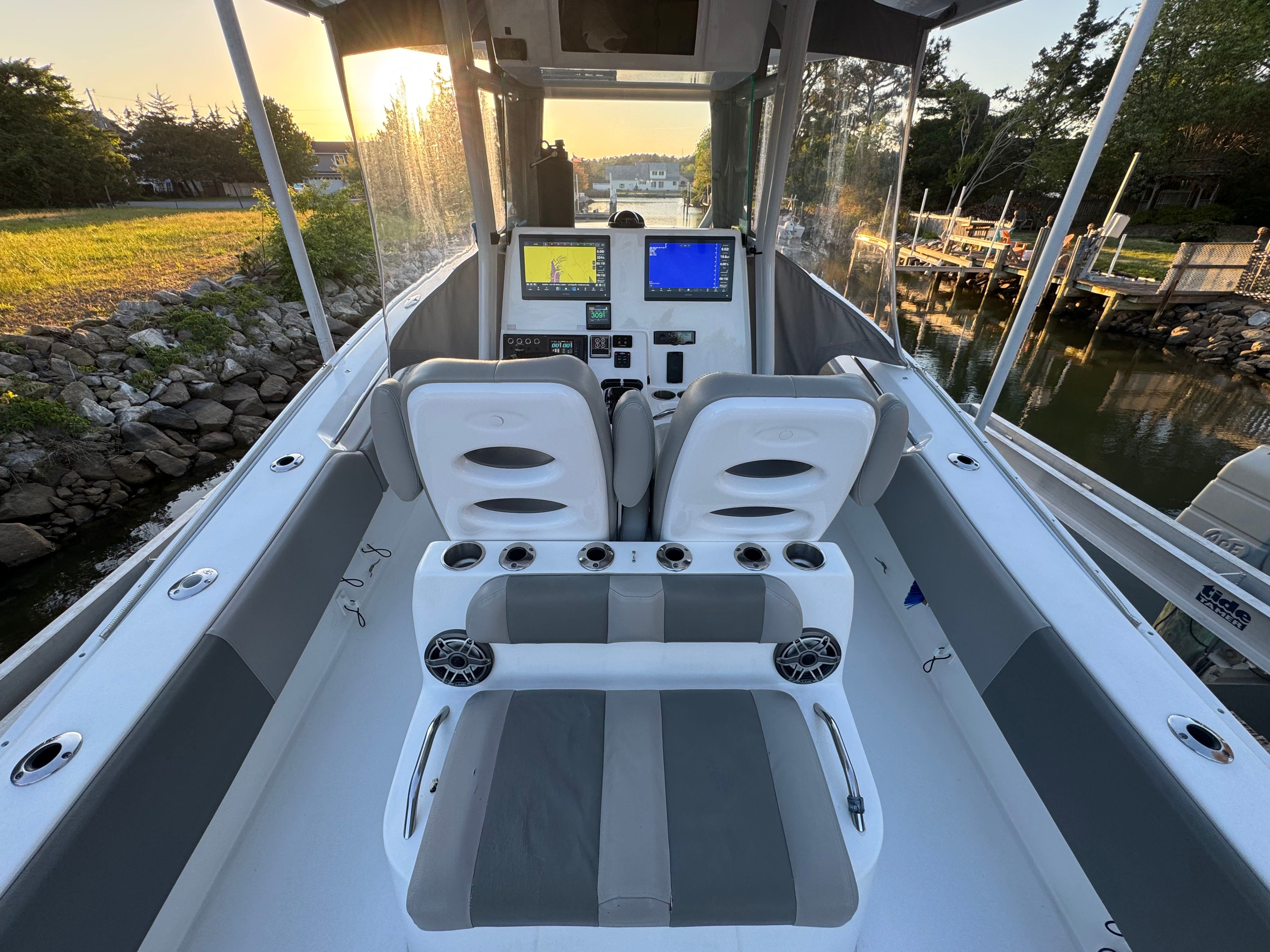 Interior view of a 2021 Cape Horn 32 XS boat at sunset.