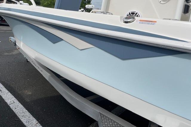 2025 Ranger 2360 Bay boat with blue hull design.