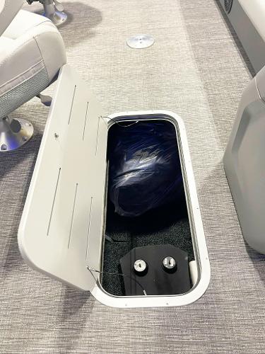 Bennington 20S 2025 model boat storage compartment with open hatch.