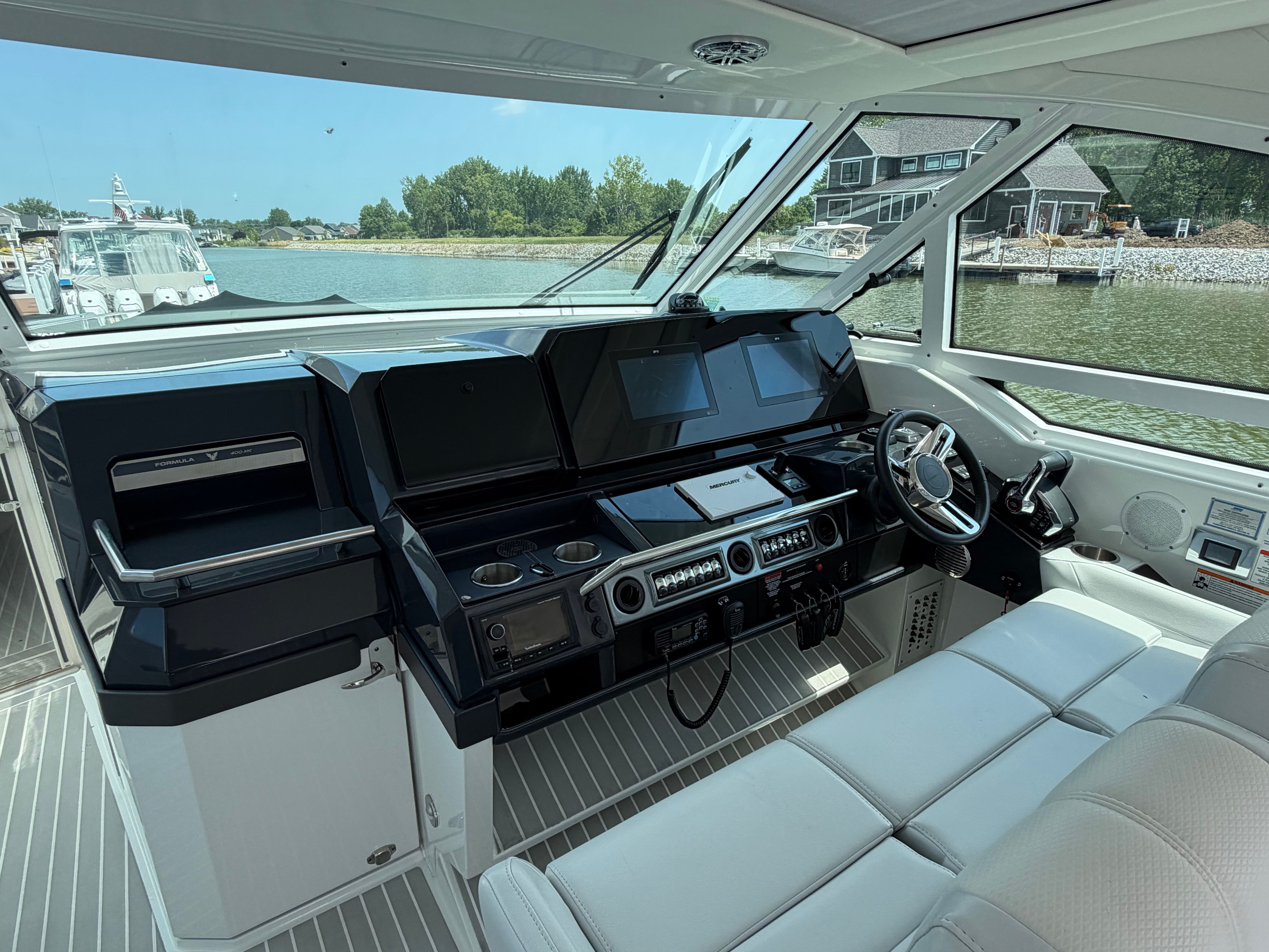The cockpit of the 2023 Formula 400 Super Sport Crossover features modern instruments and sleek design.
