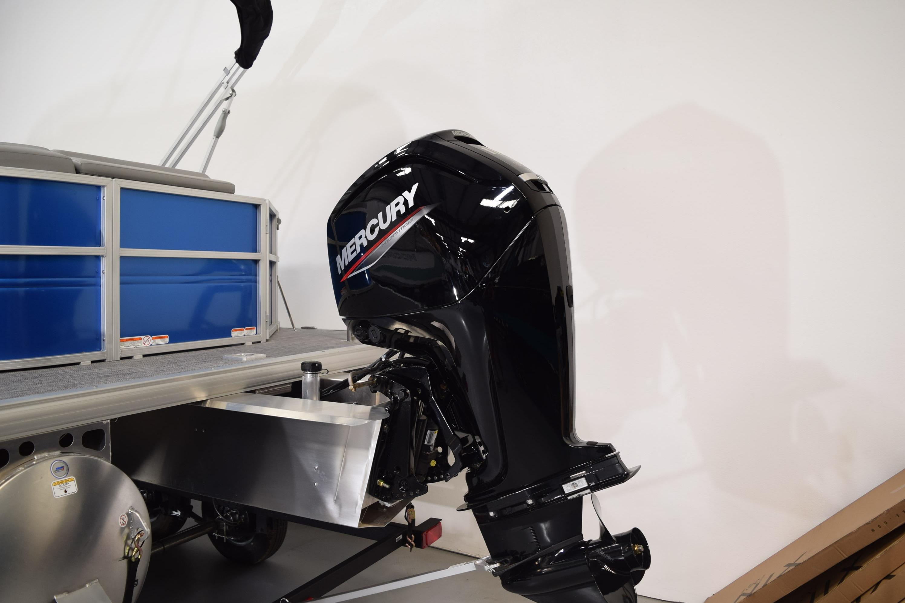 2026 Sun Tracker Party Barge 20 DLX with Mercury outboard motor.