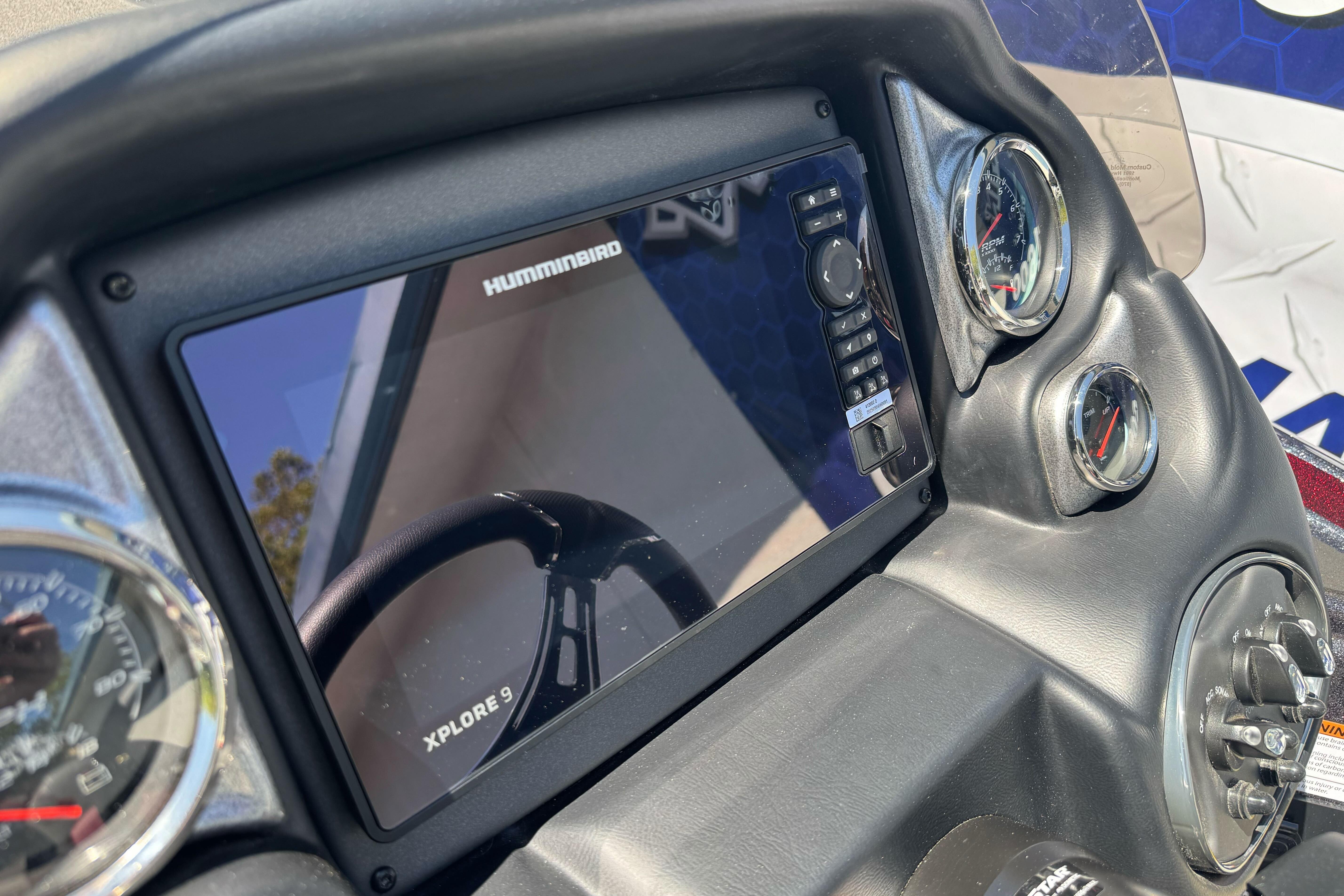 Dashboard of 2026 Triton 18 TrX with Humminbird Xplore 9 display.