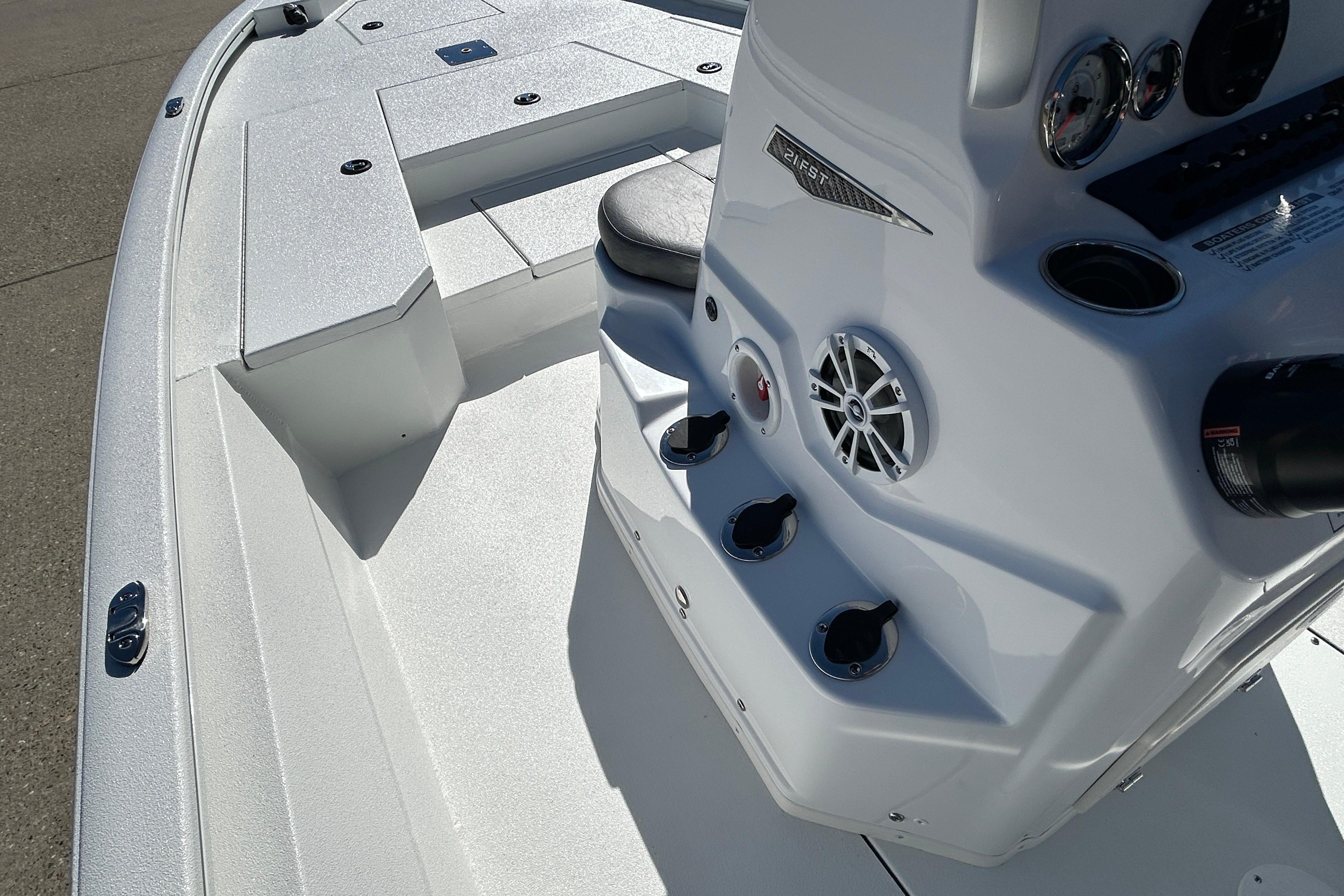 2026 Avid 21 FST boat interior with control panel and seating.