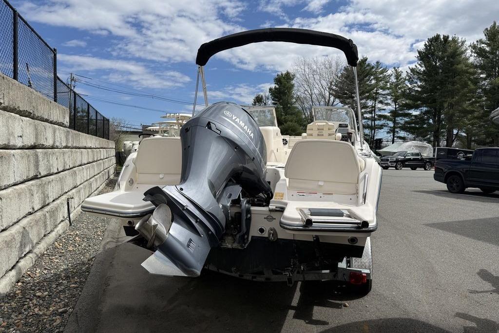 2019 Grady-White Freedom 215 boat with Yamaha outboard motor, parked outdoors.