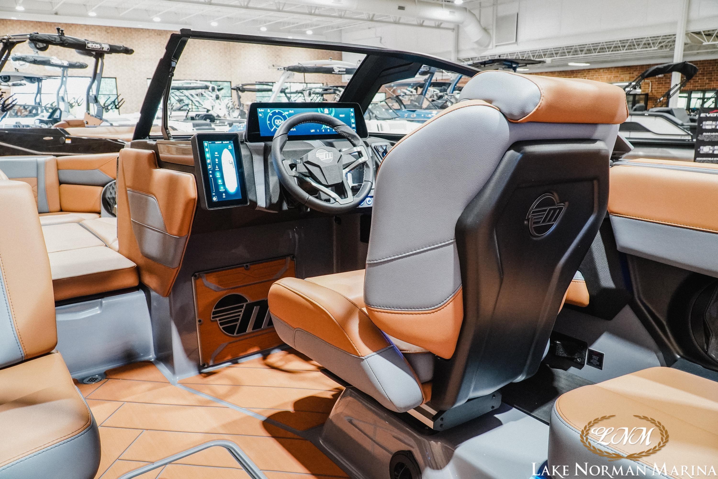 2026 Malibu Wakesetter 23 LSV interior with modern dashboard and leather seating.