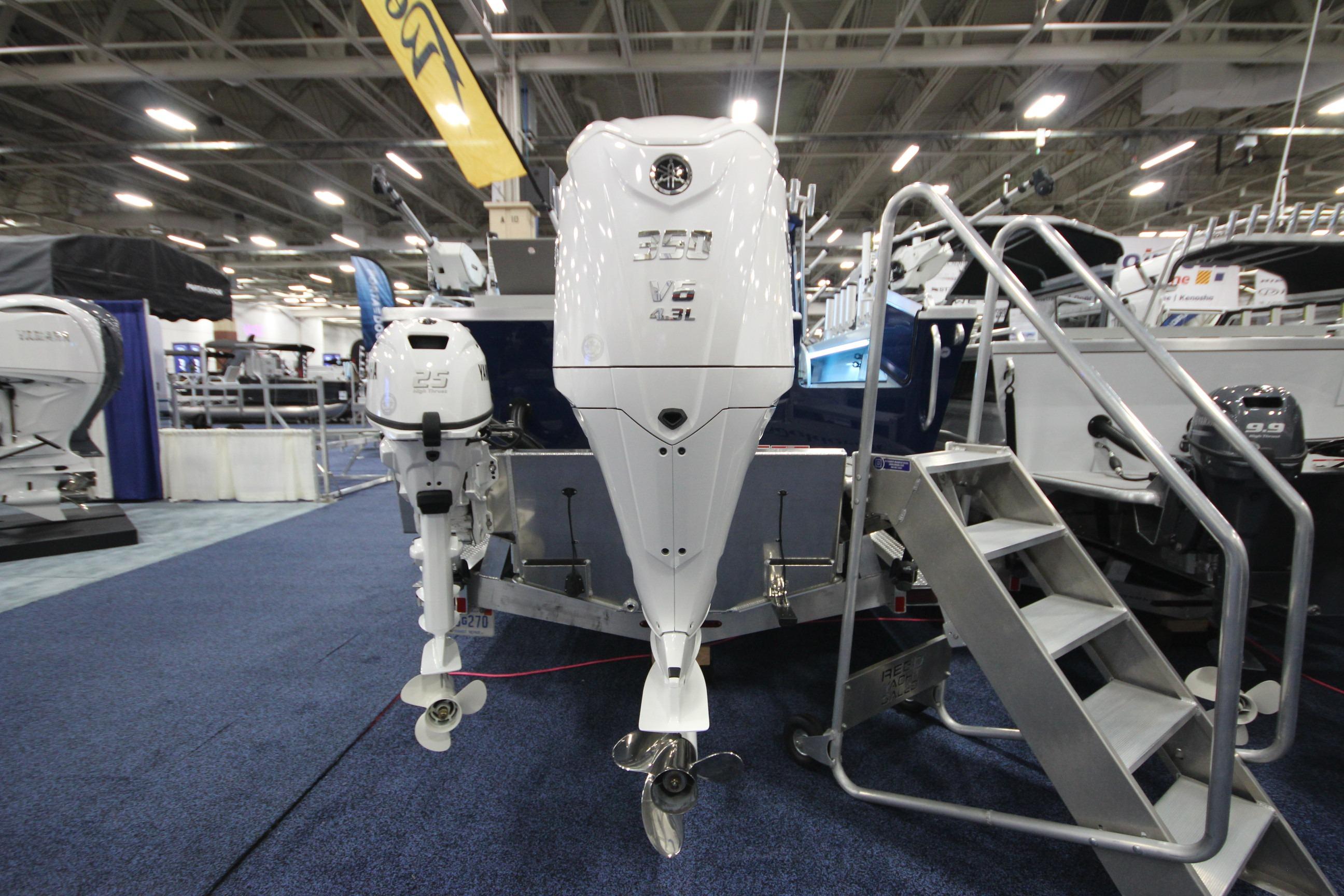 2026 Weldcraft 260 Ocean King boat with F350XSB engine displayed indoors.