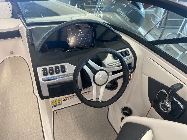 Interior of 2023 Regal 2000 ES Bowrider with steering console.