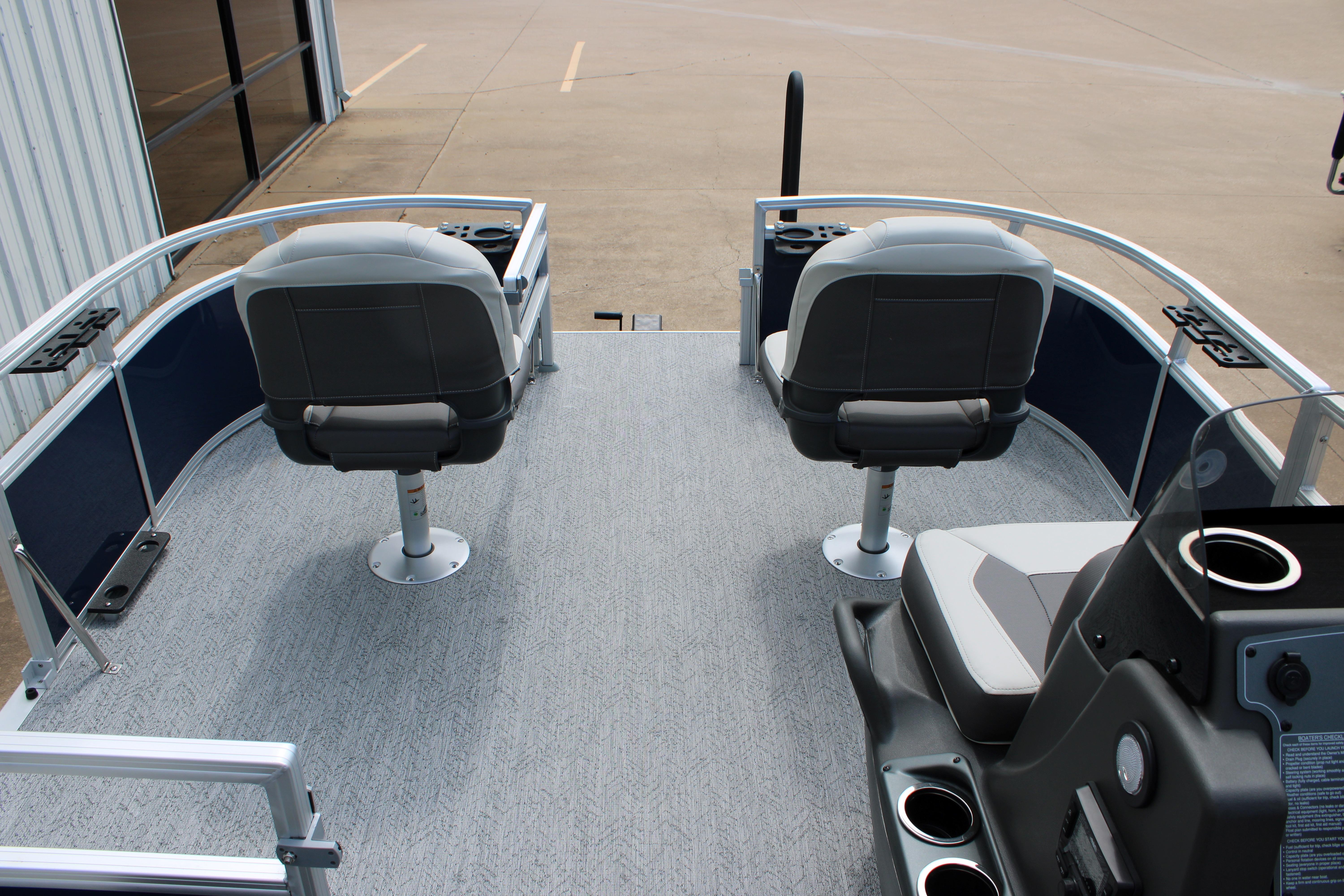 2026 Sun Tracker Bass Buggy 16 XL Select pontoon boat interior with seating and console.