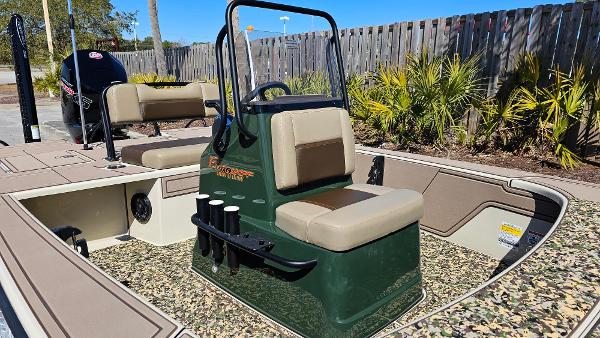 2025 Mako 18 Pro Skiff Backwater Edition boat with seating and rod holders.