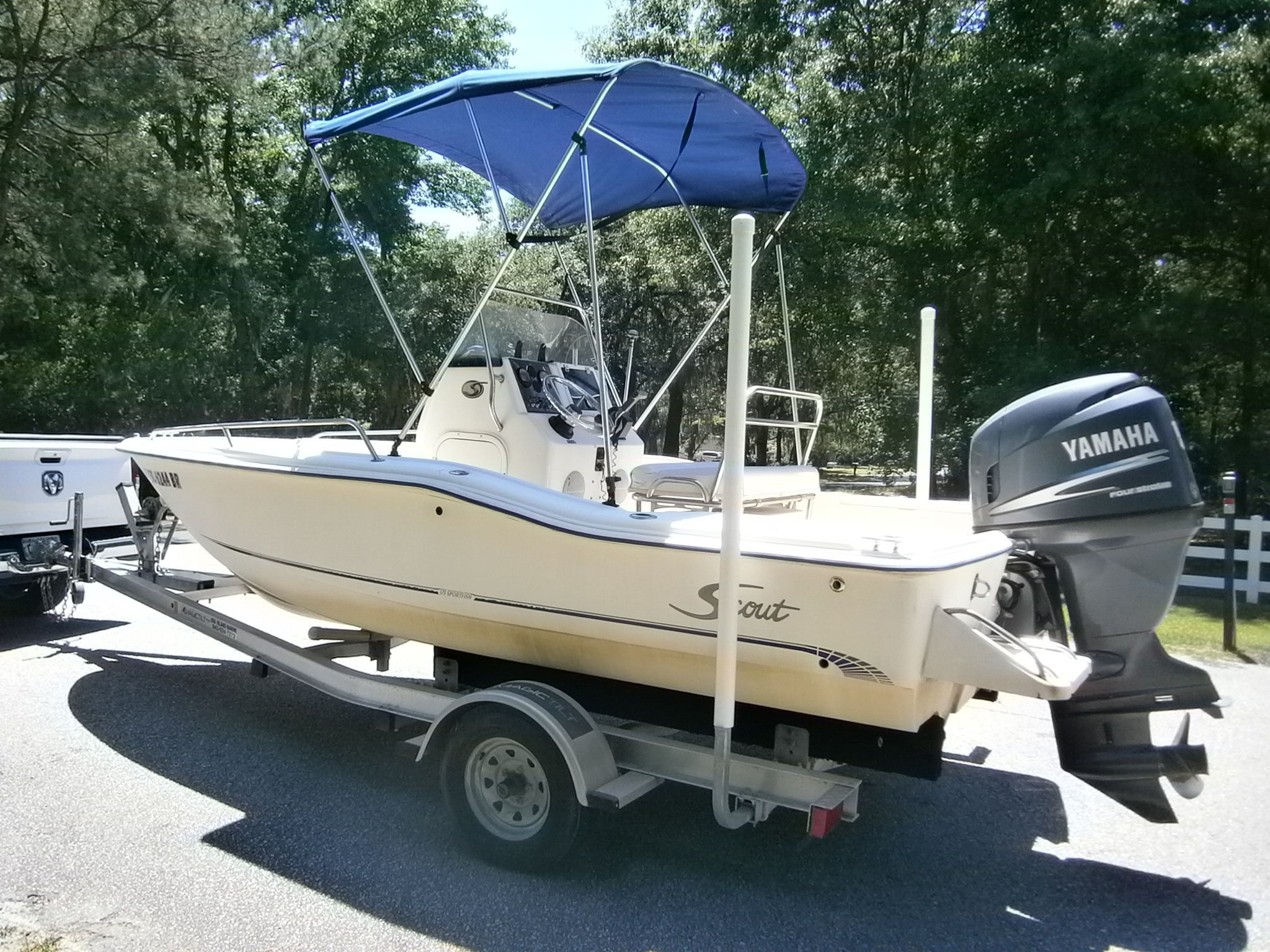 2004 Scout 175 Sportfish boat with Yamaha engine on trailer.