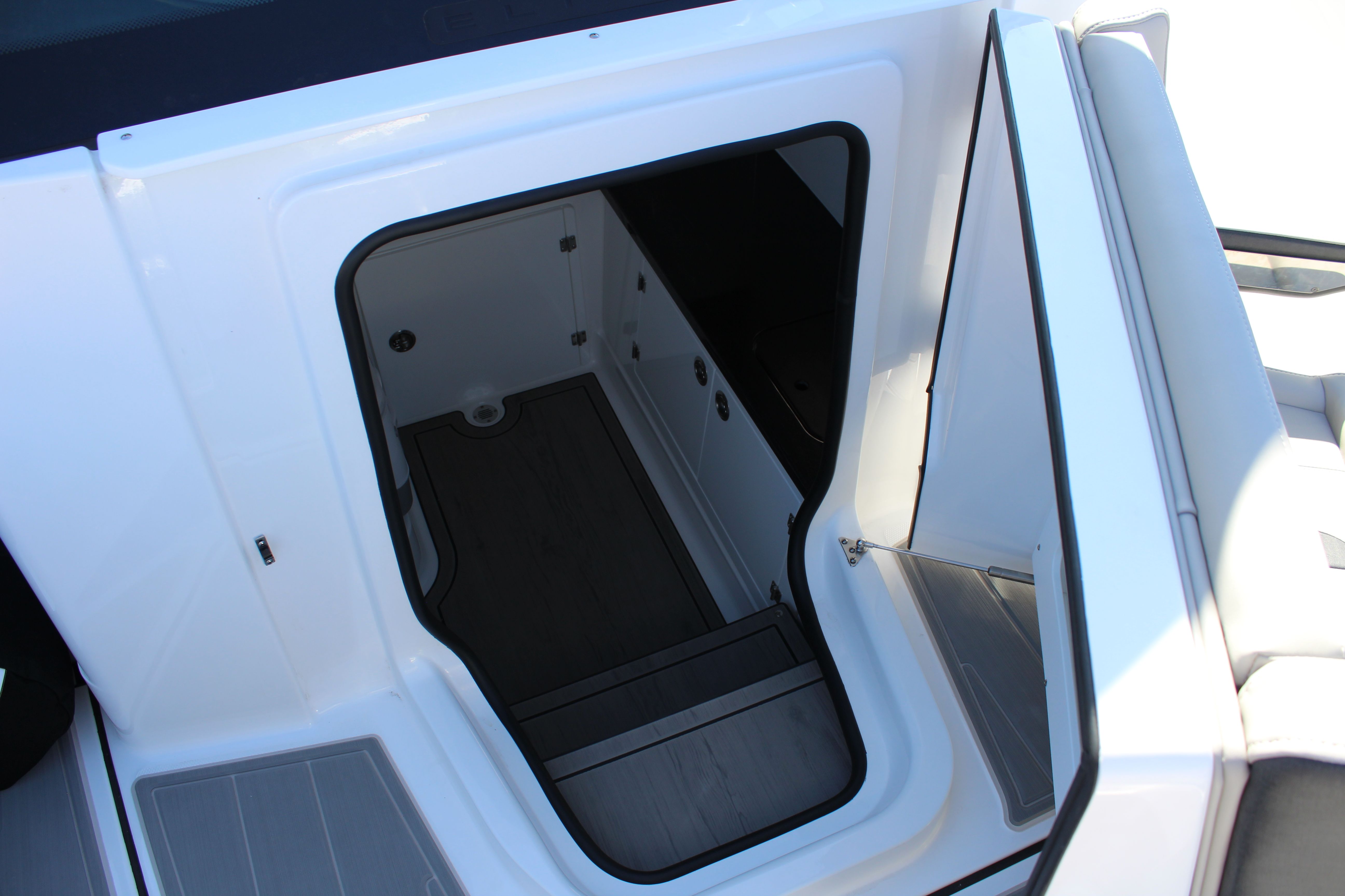 Interior of 2025 Monterey Elite 27 OB with open door.