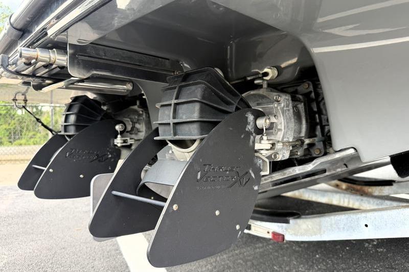 2017 Yamaha Boats SX210 jet propulsion system close-up, showcasing dual engines and steering components.