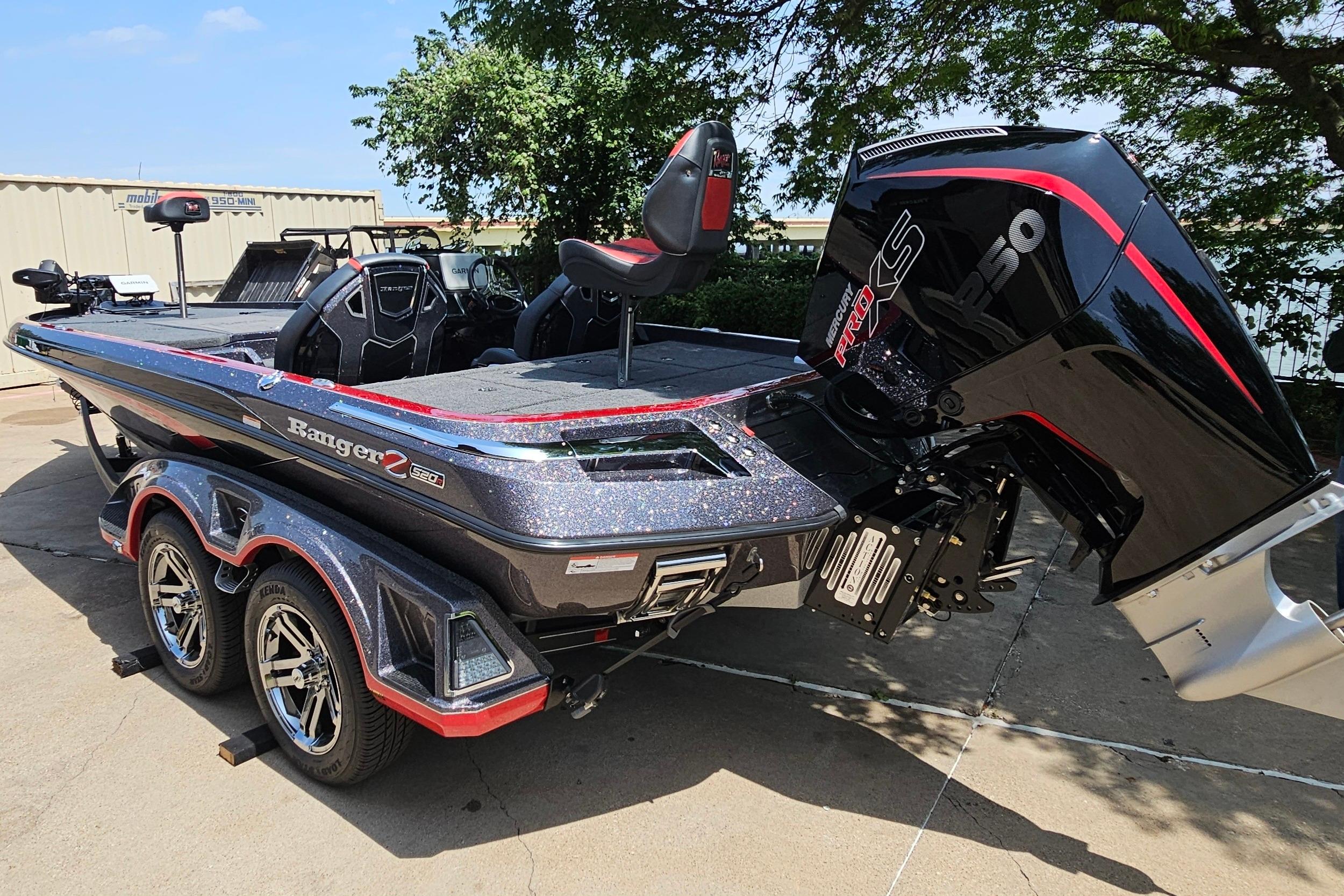 2026 Ranger Z520R boat with powerful engine, sleek design, and dual-axle trailer.
